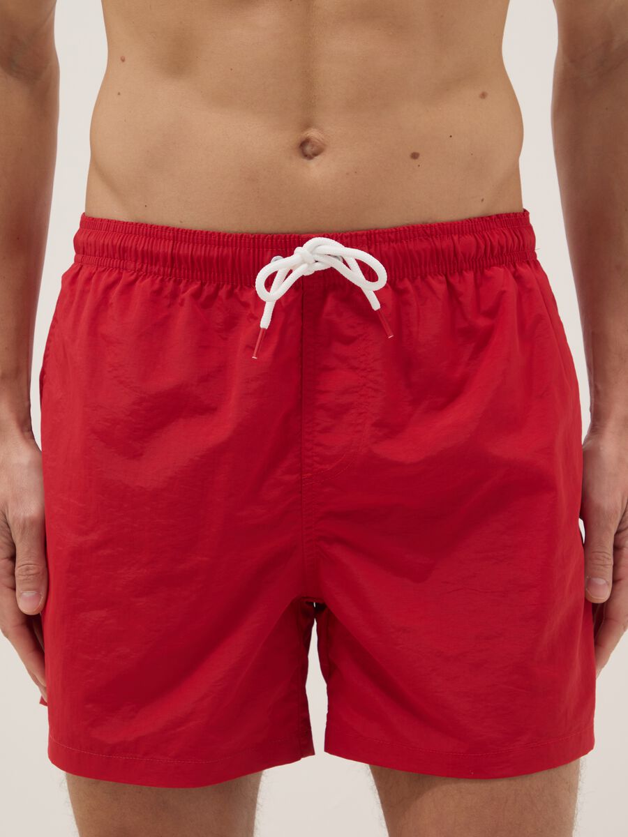 Red swim shorts with elasticated waist_1
