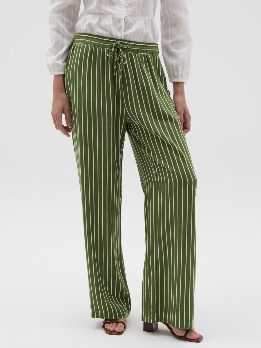 Striped green palazzo trousers in viscose and linen_1