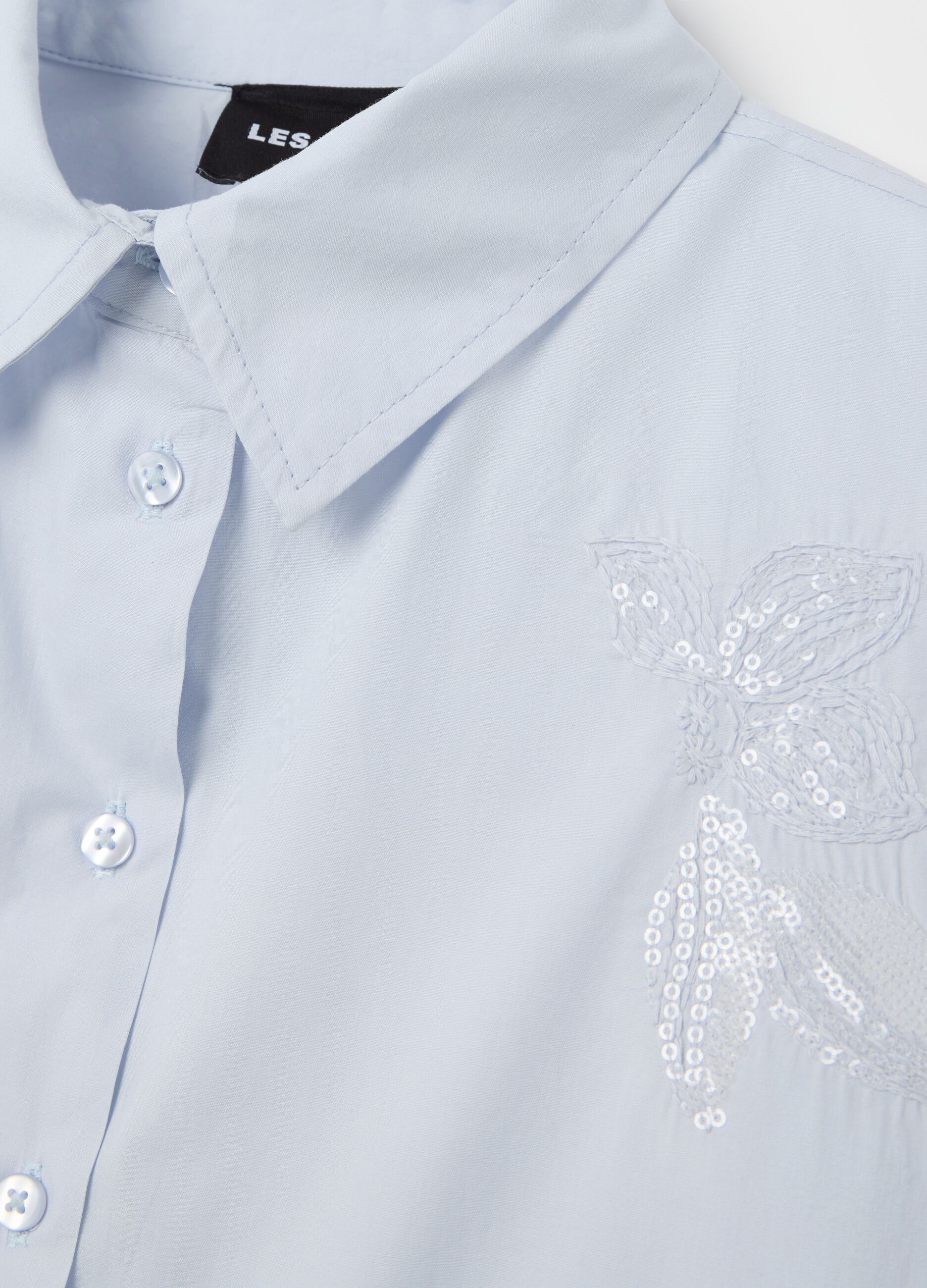 Light blue cropped shirt with floral embroidery