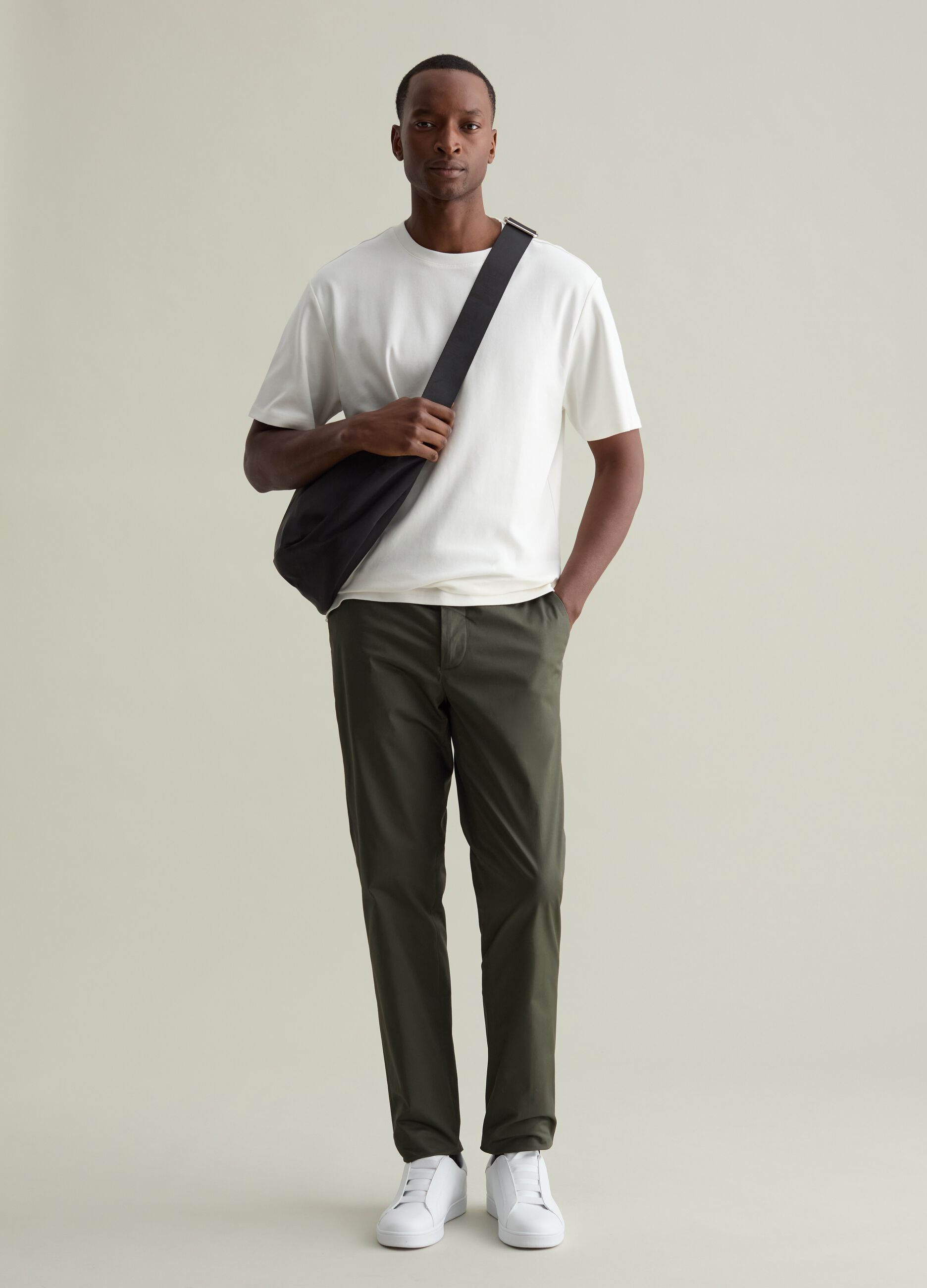 Contemporary half-moon bag with shoulder strap