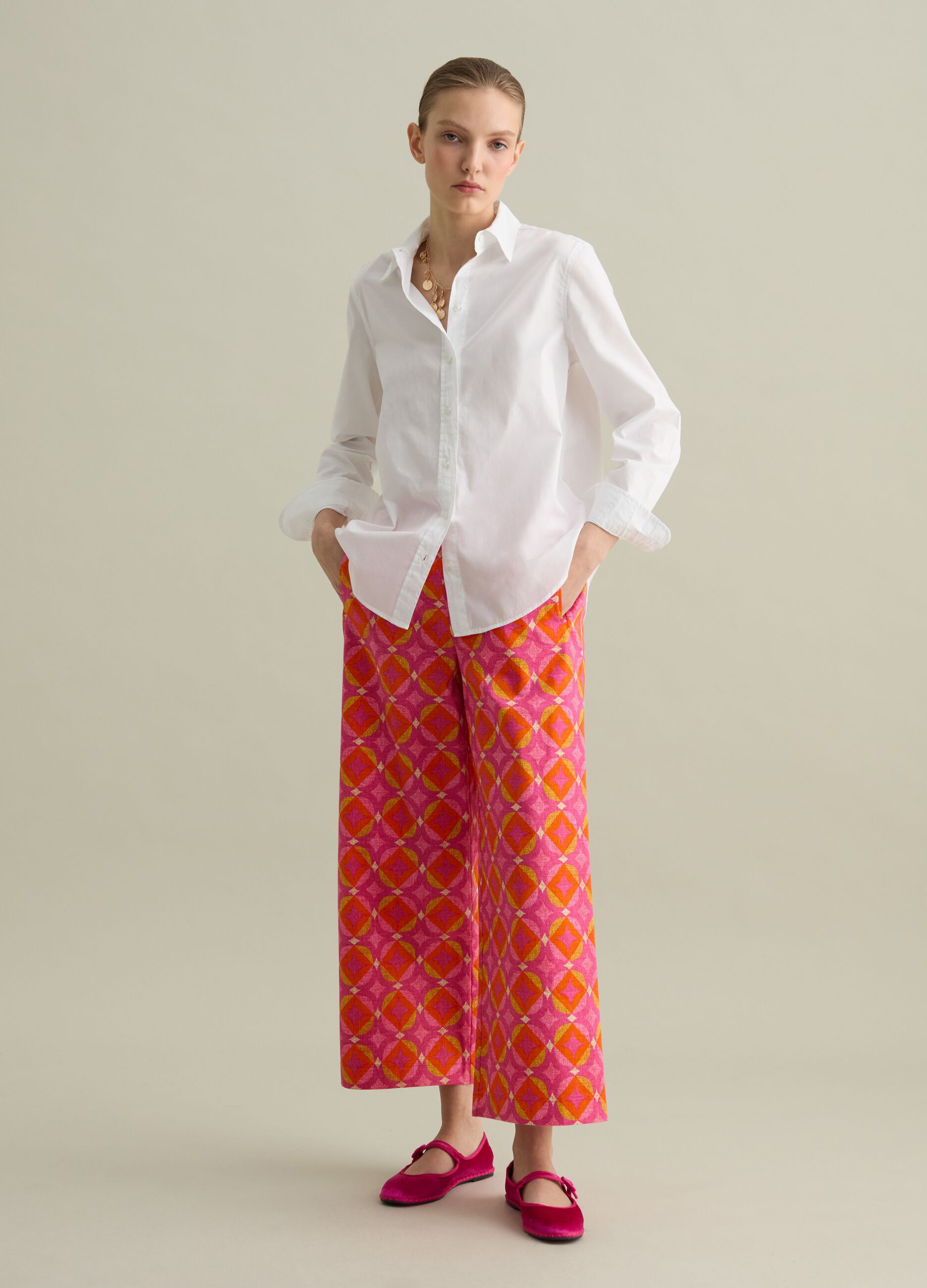 Pantalone a gamba larga stampa all-over