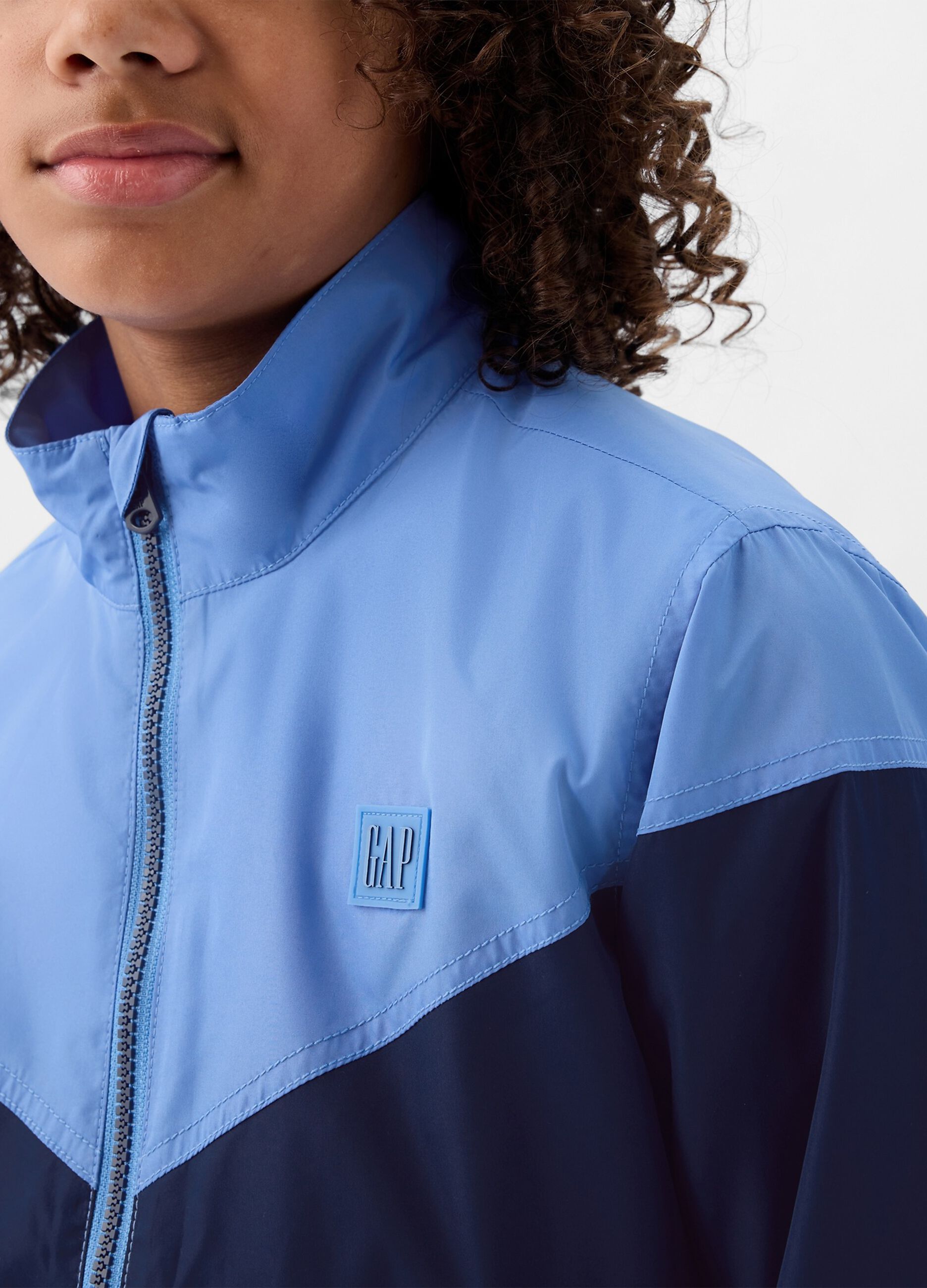 Two-tone windbreaker with logo patch