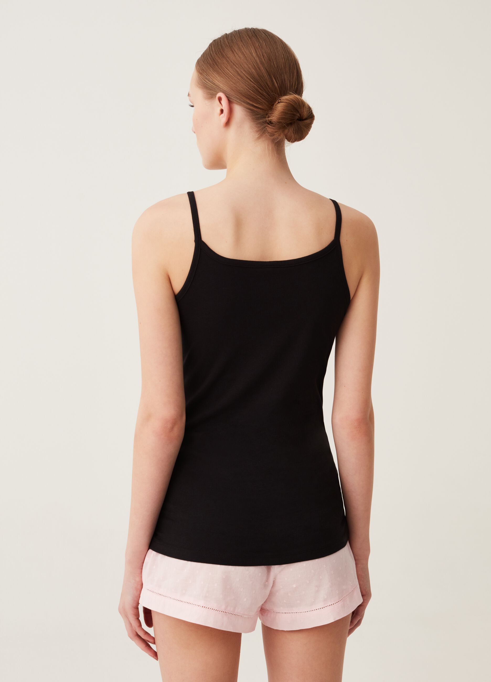 Two-pack jersey vests with round neck.