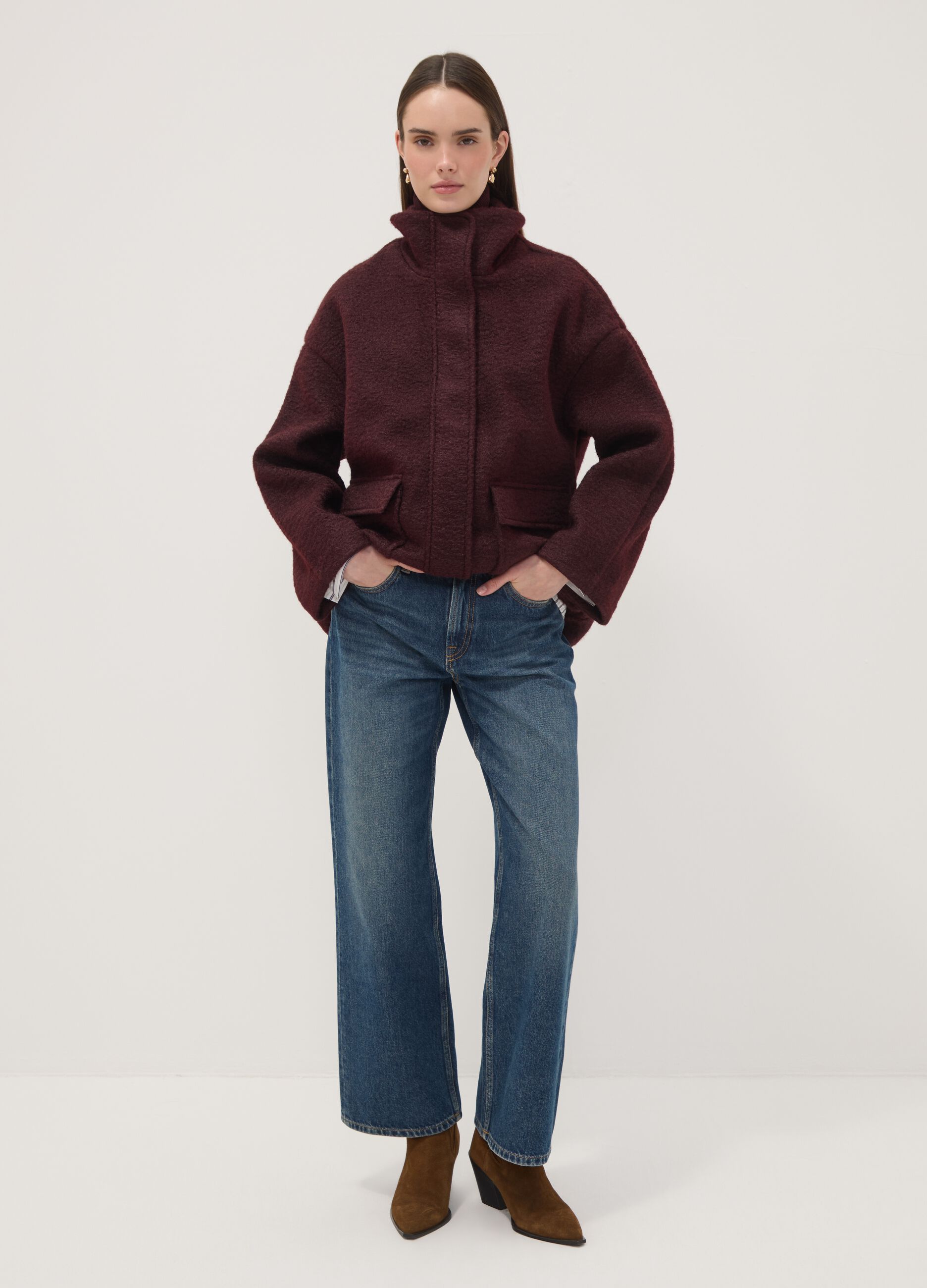 Red jacket with zip and press studs