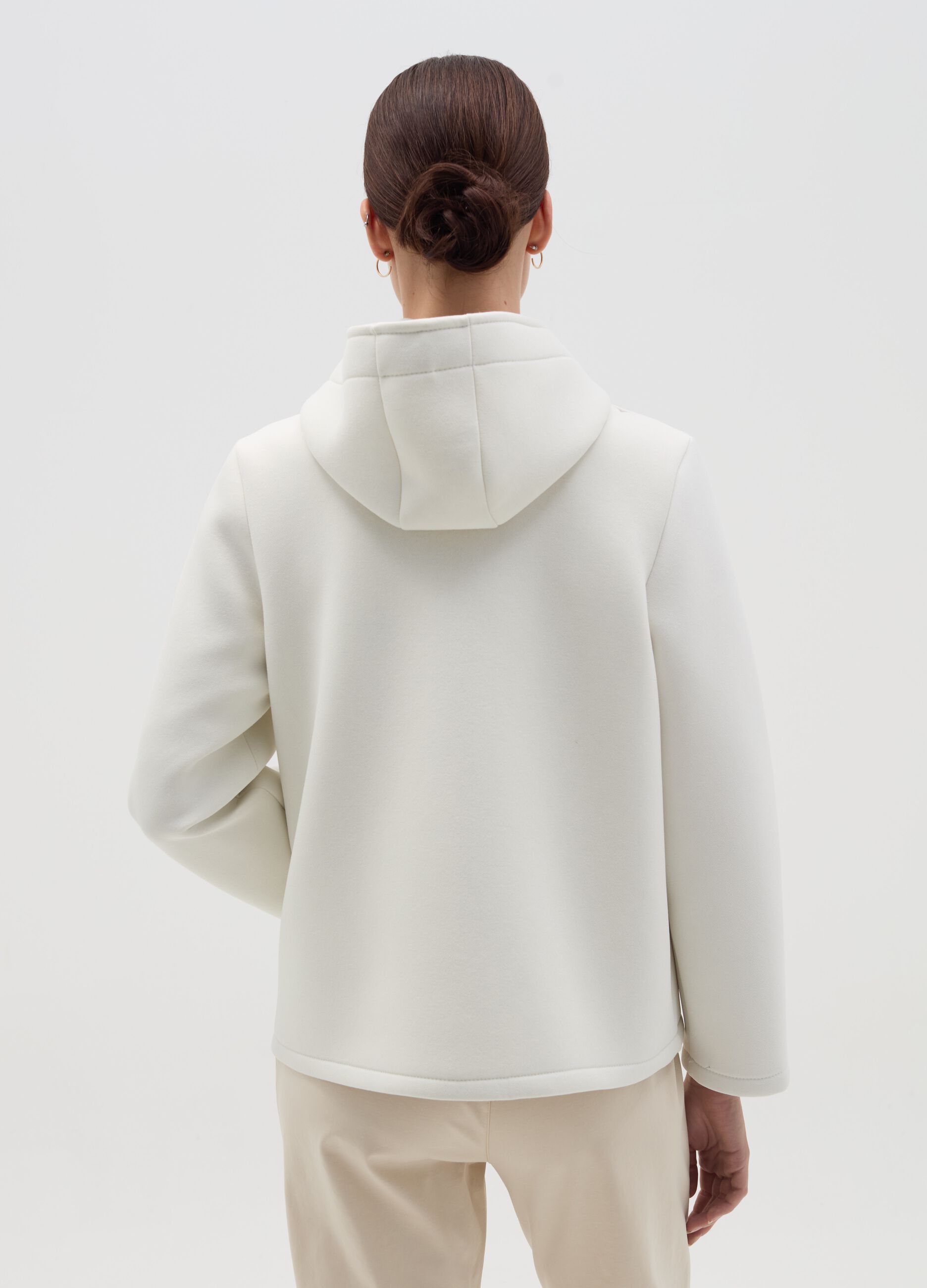 Short jacket with hood and buttons