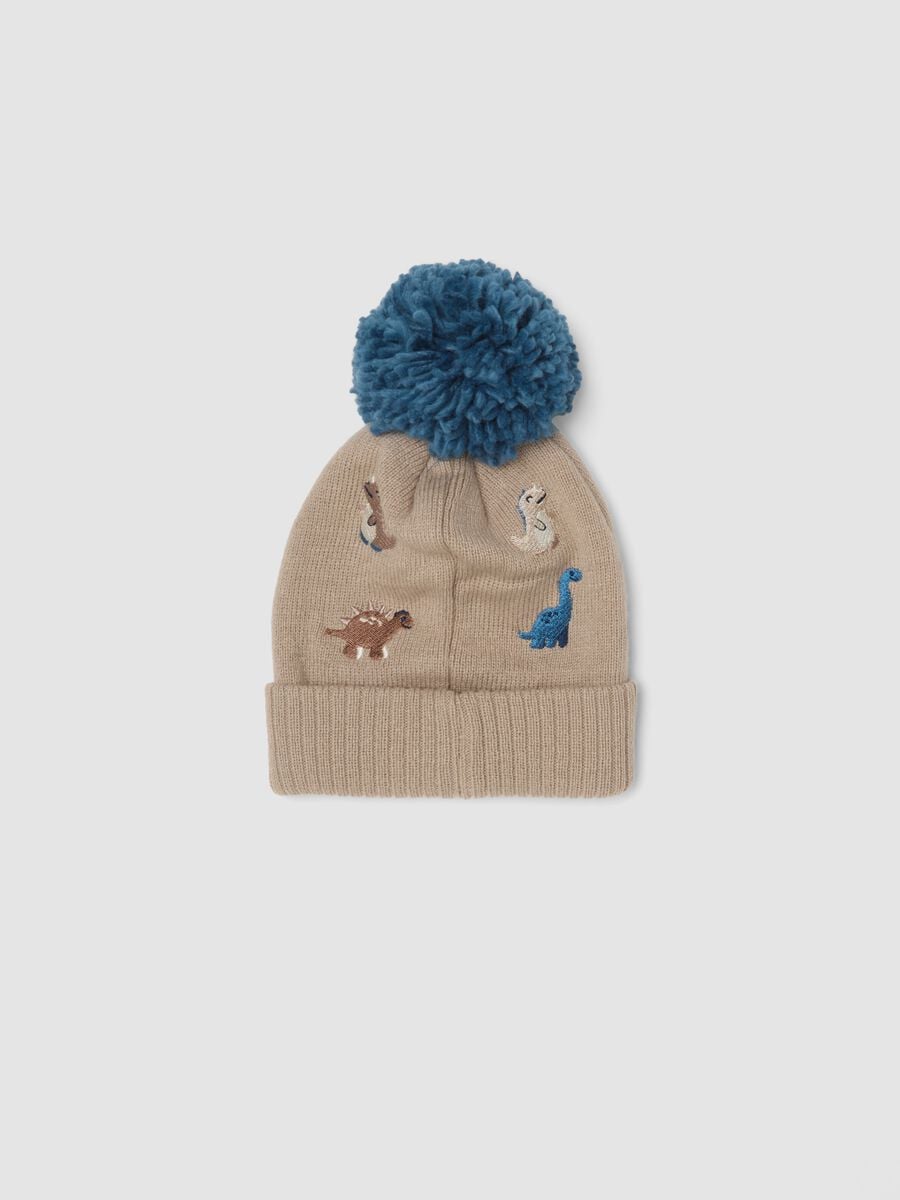 Cappello beige con pon pon e dinosauri_1