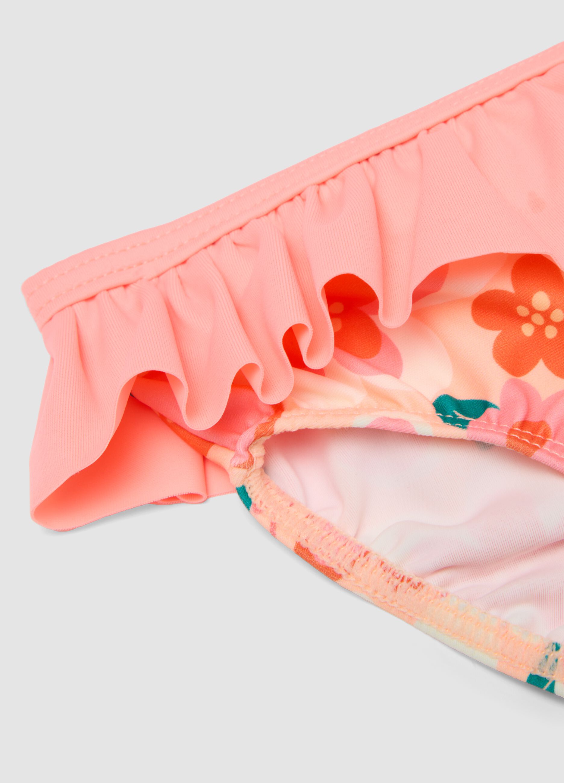 Pink stretchy fabric swim briefs with ruffles for baby girls