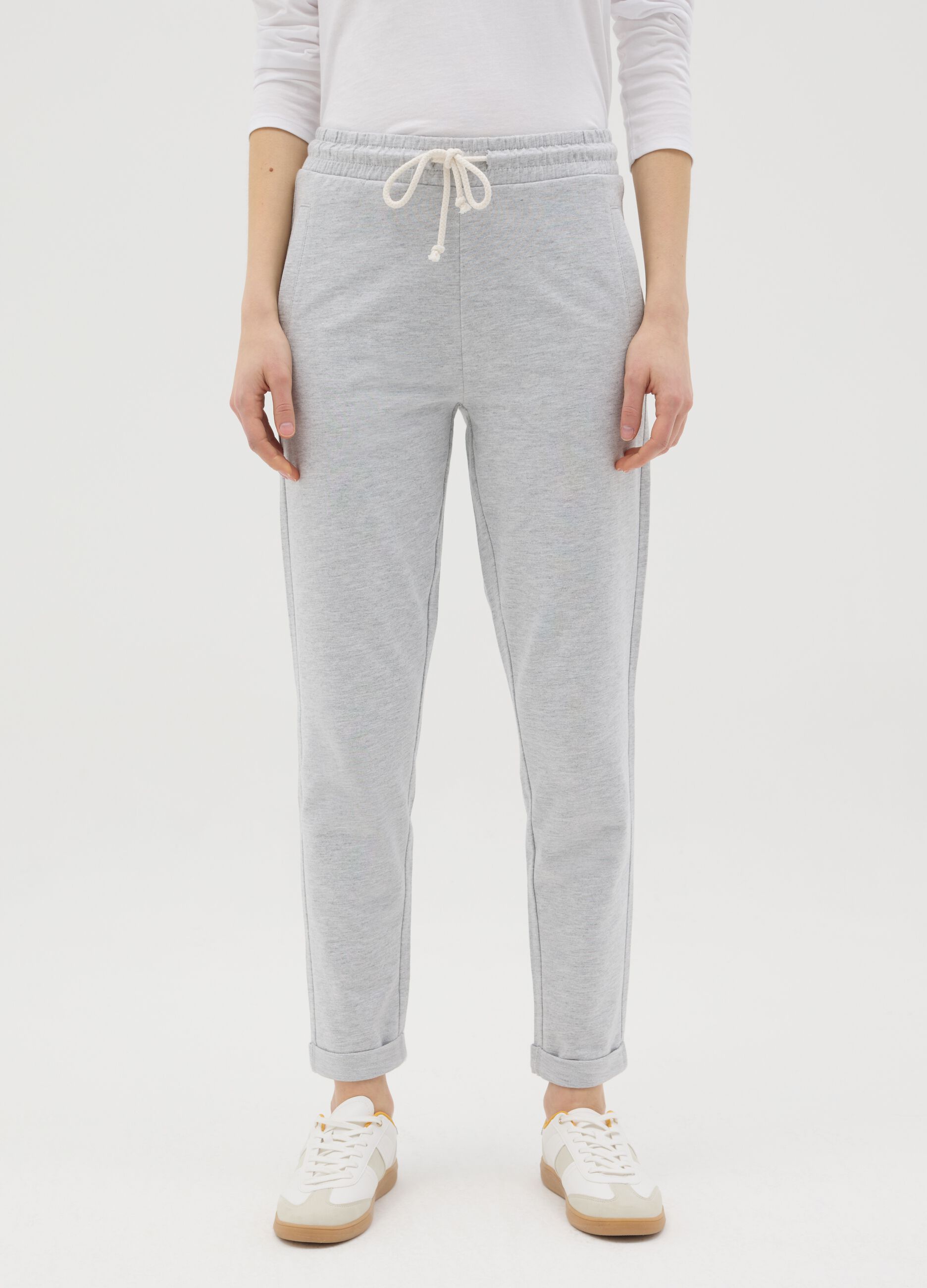 Grey joggers in French terry with drawstring