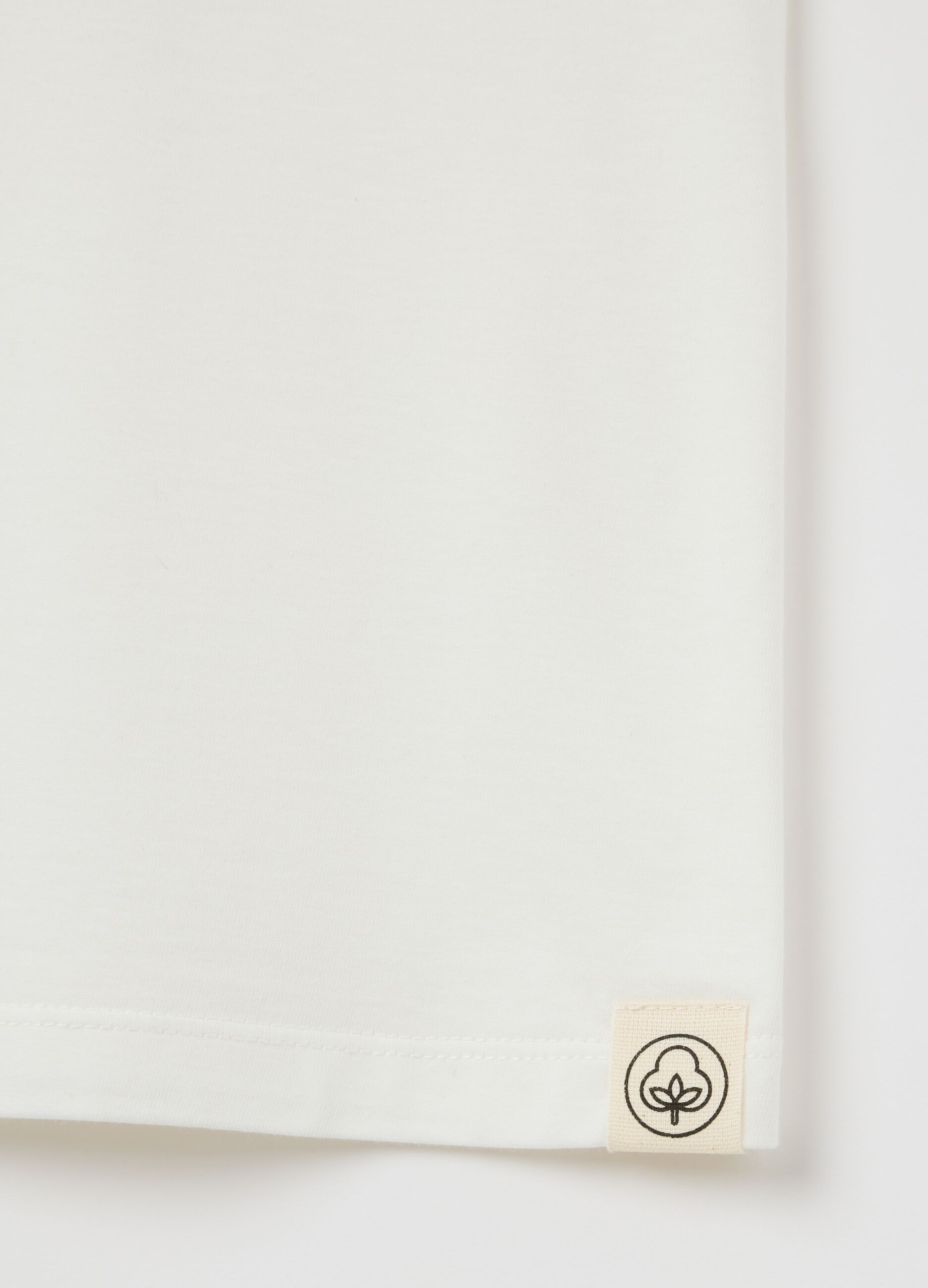 Women's full-length white sleeveless dress in 100% cotton