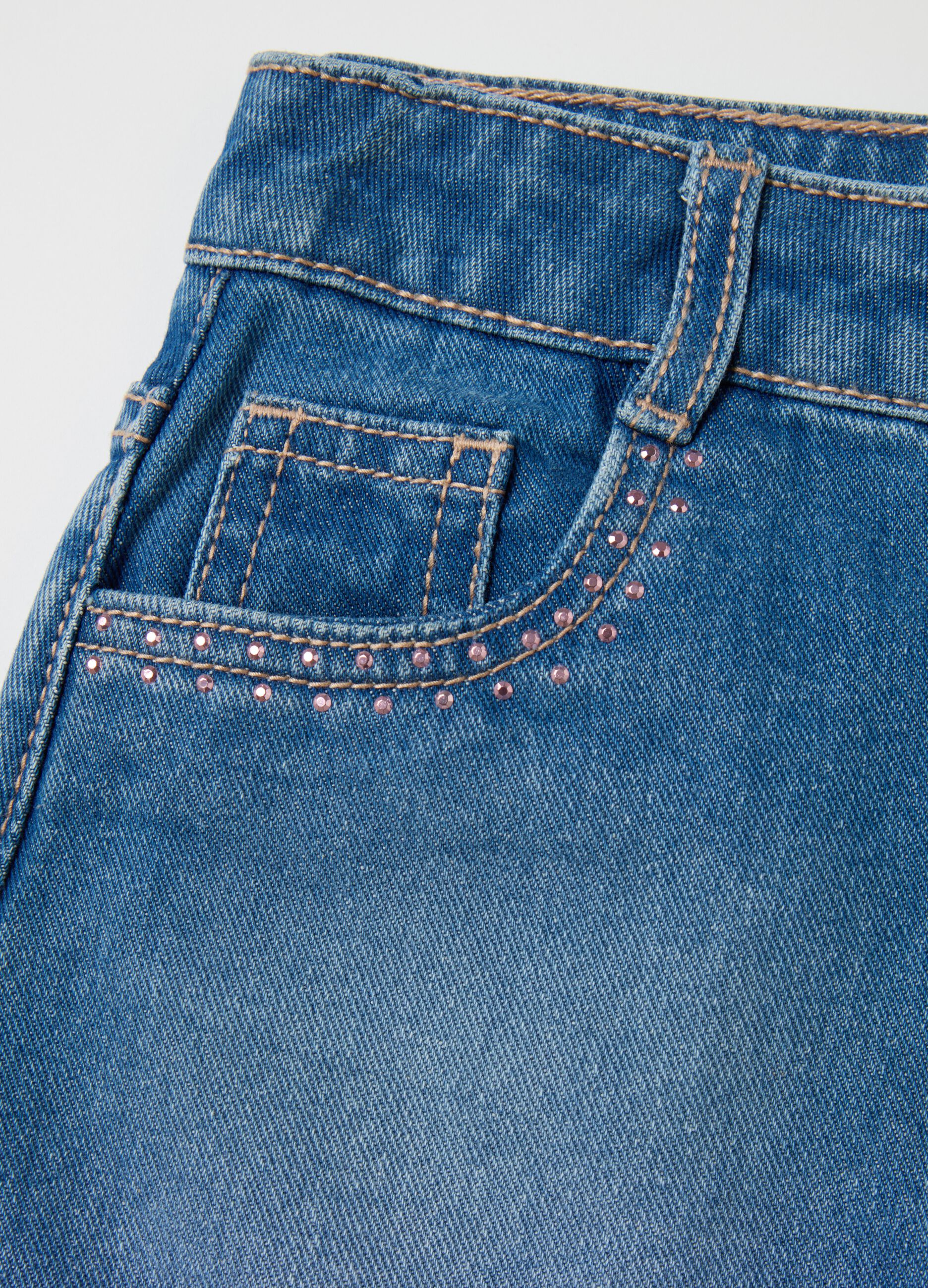 Denim miniskirt with diamantés