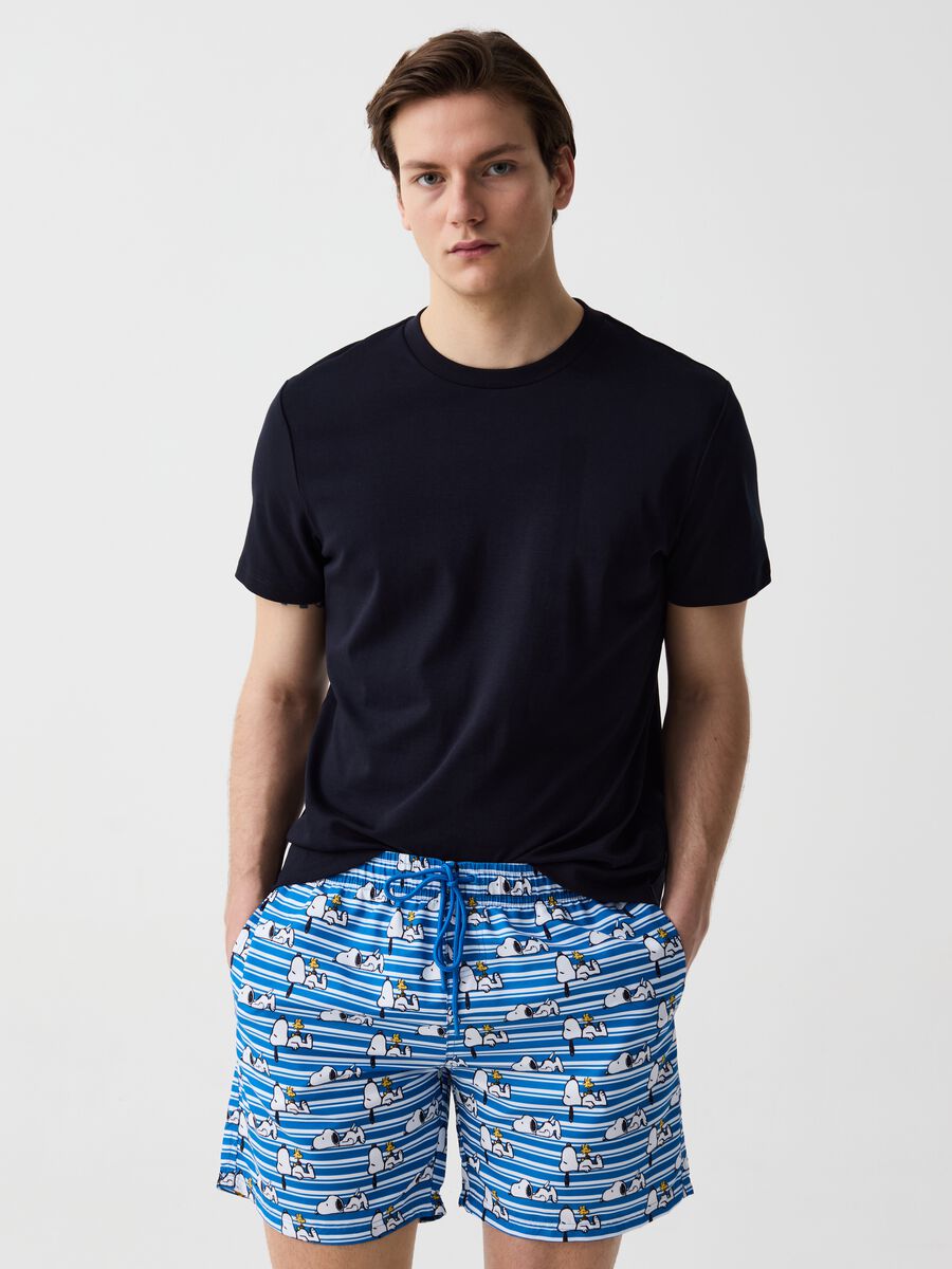 Striped swimming trunks with Snoopy print_0