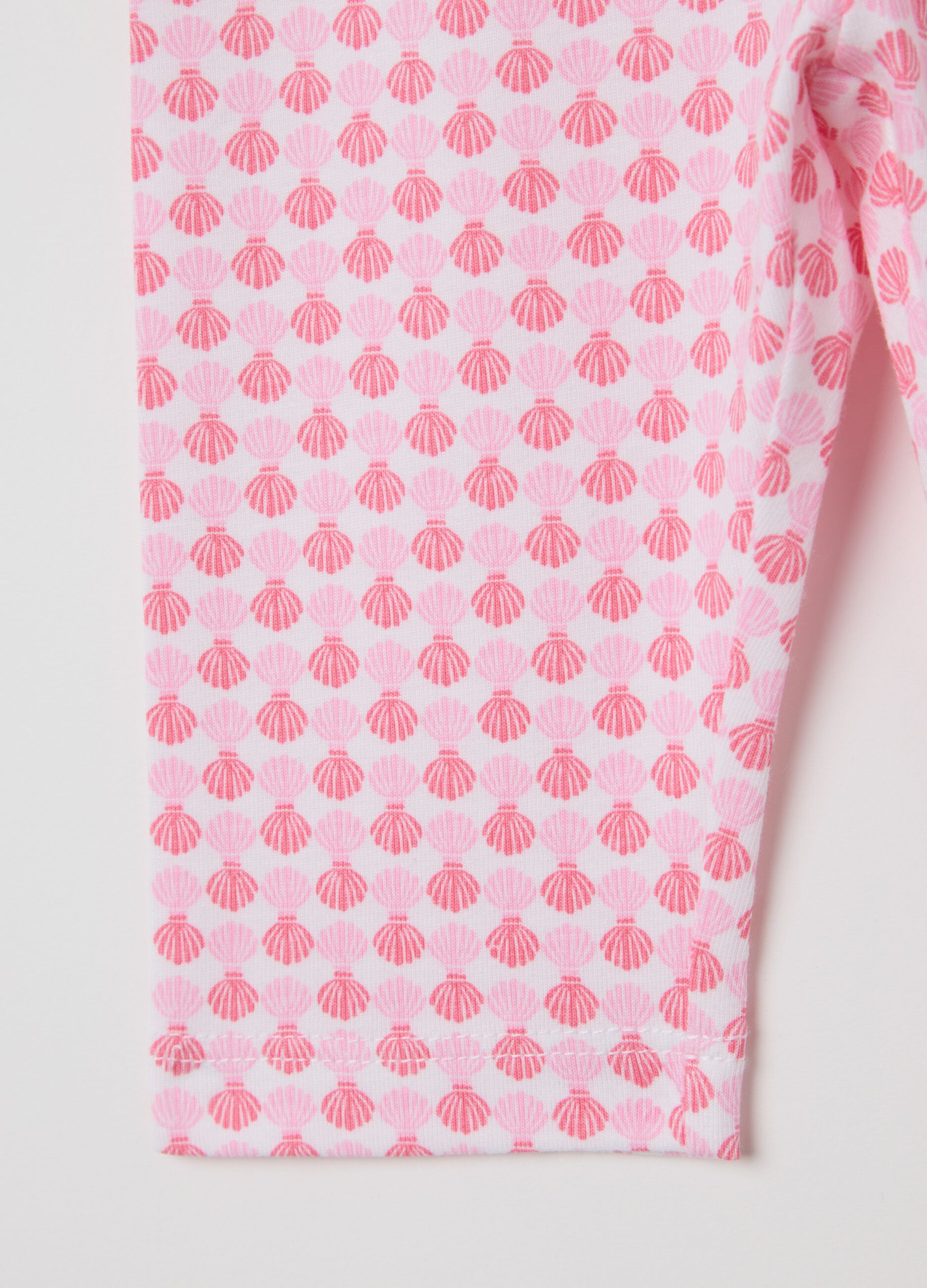 White and pink three-quarter stretch leggings with print