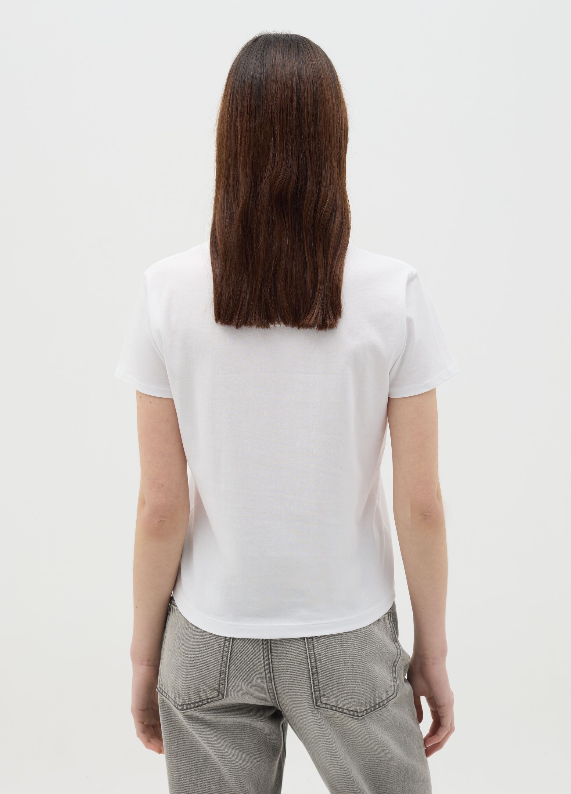 T-shirt bianca in cotone con stampa gattino "Attenzione mordo!"