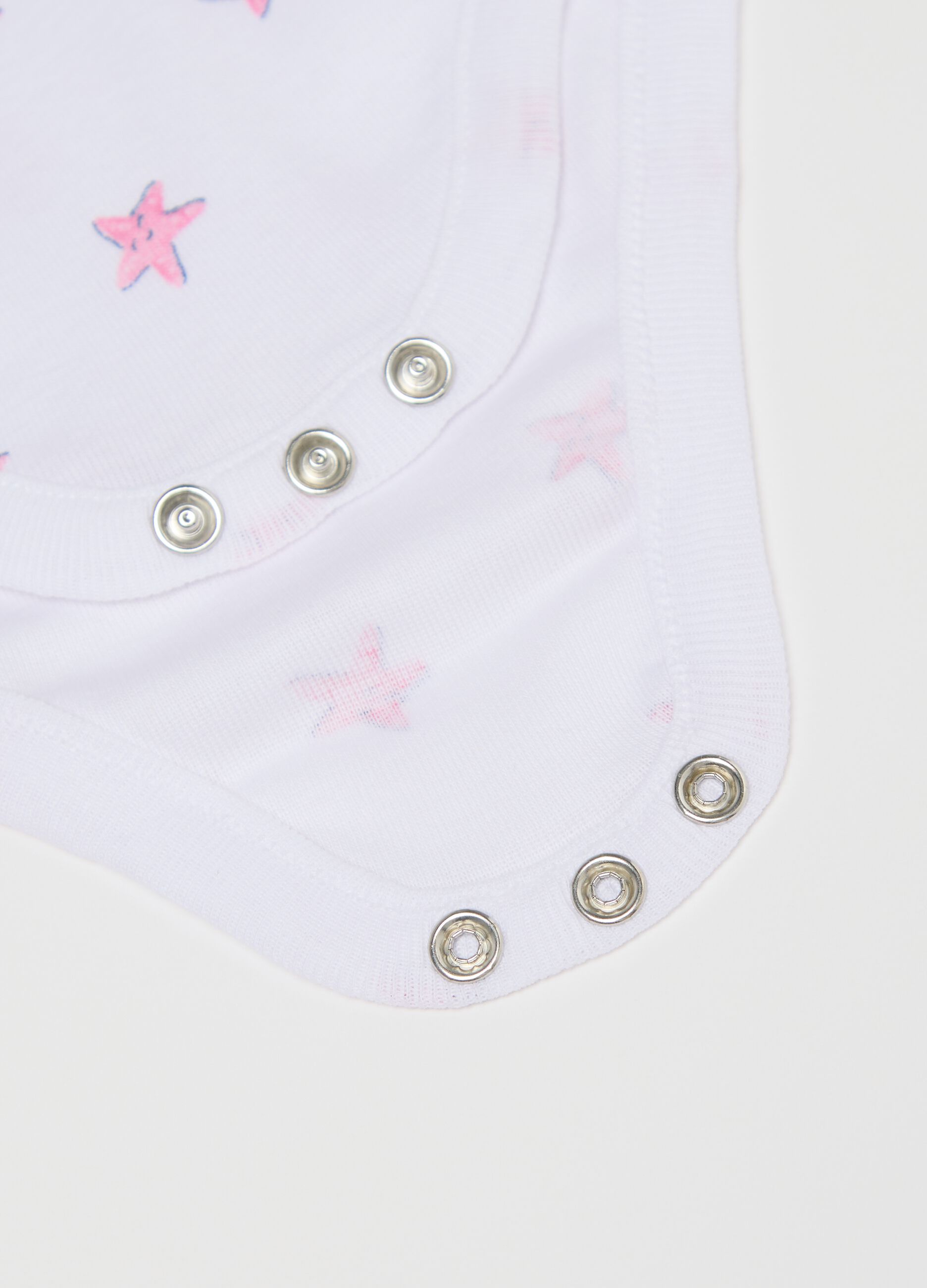 Three-pack sleeveless bodysuits with print