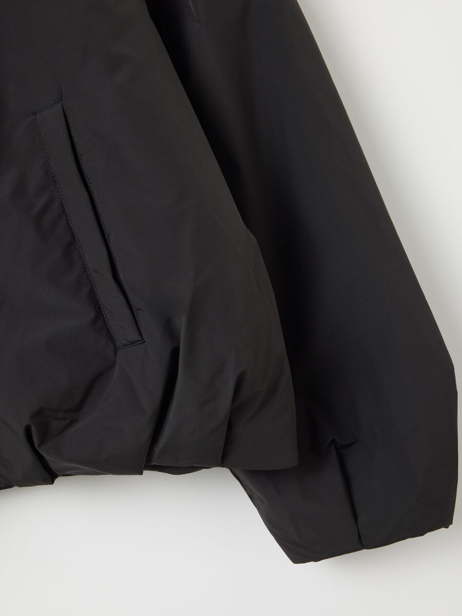 Giacca nera imbottita regular fit e zip_1