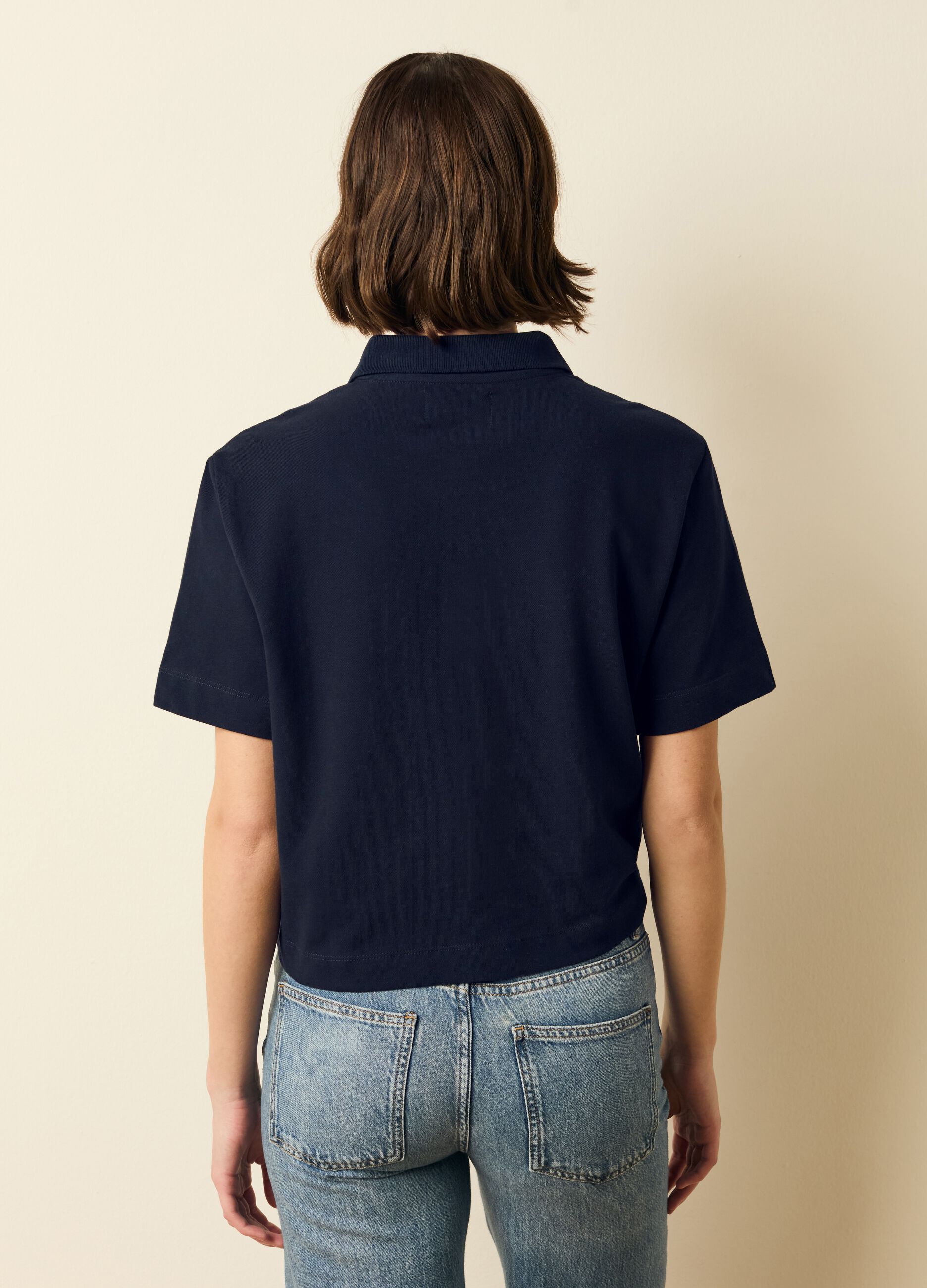 Polo shirt in solid colour piquet