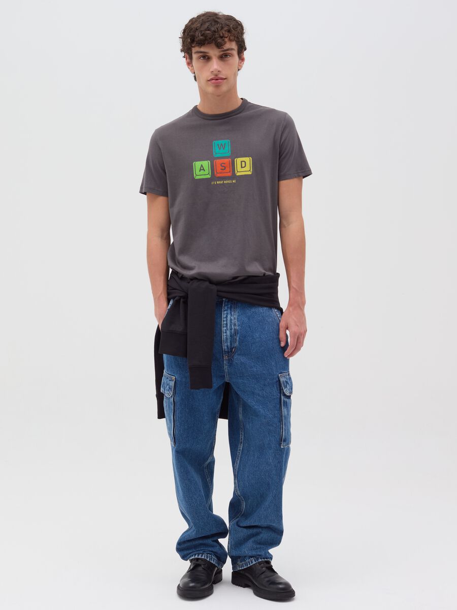 T-shirt with “It’s what moves me” print_1