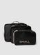 Set di tre organizer neri da viaggio con zip rosa_0