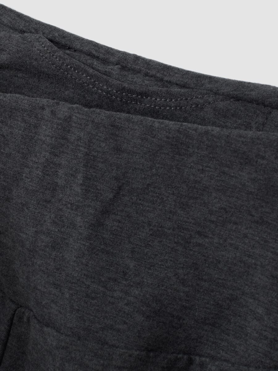 Leggings grigi flare in tessuto elasticizzato_1