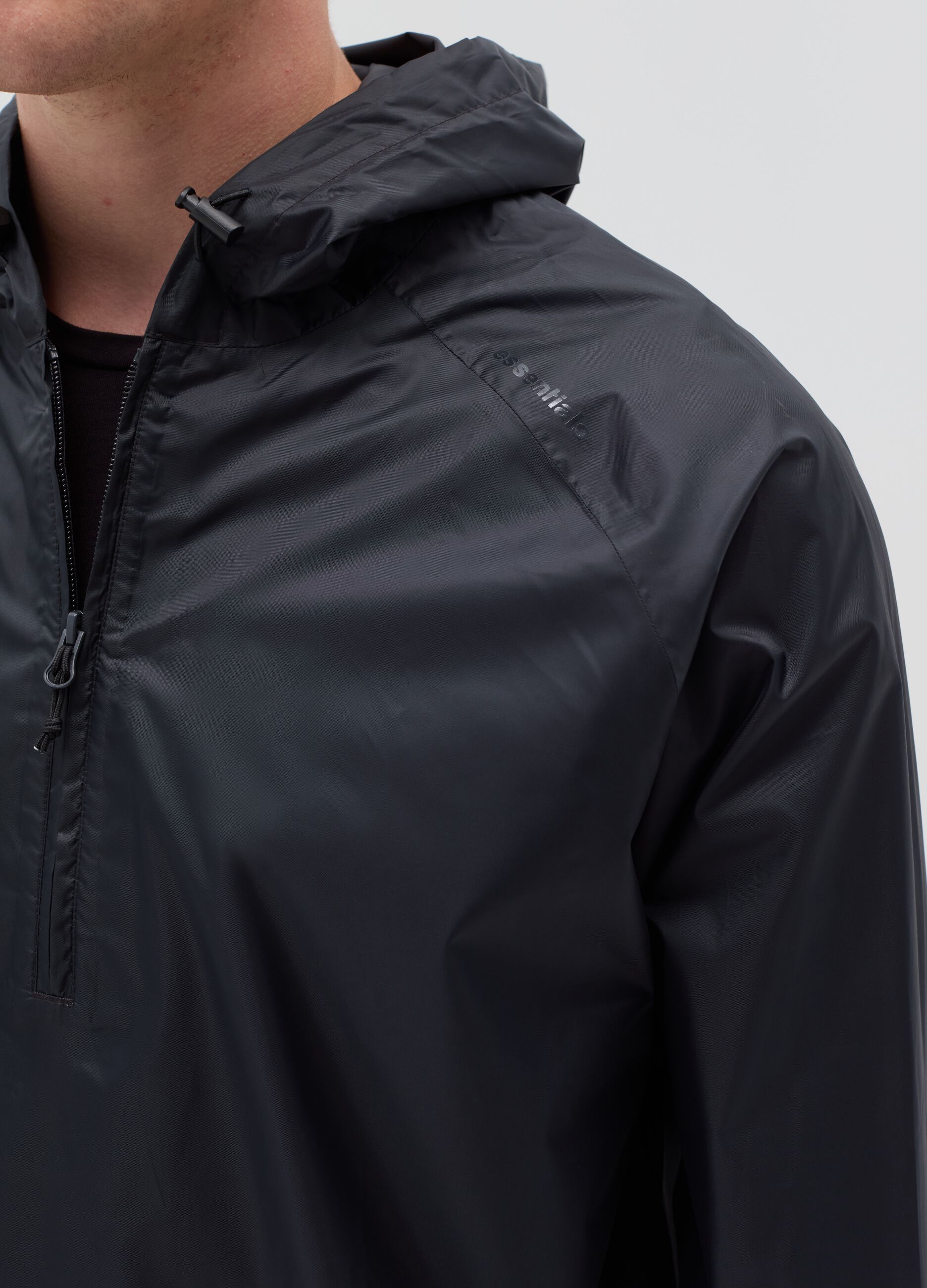 Giacca Essential impermeabile half-zip
