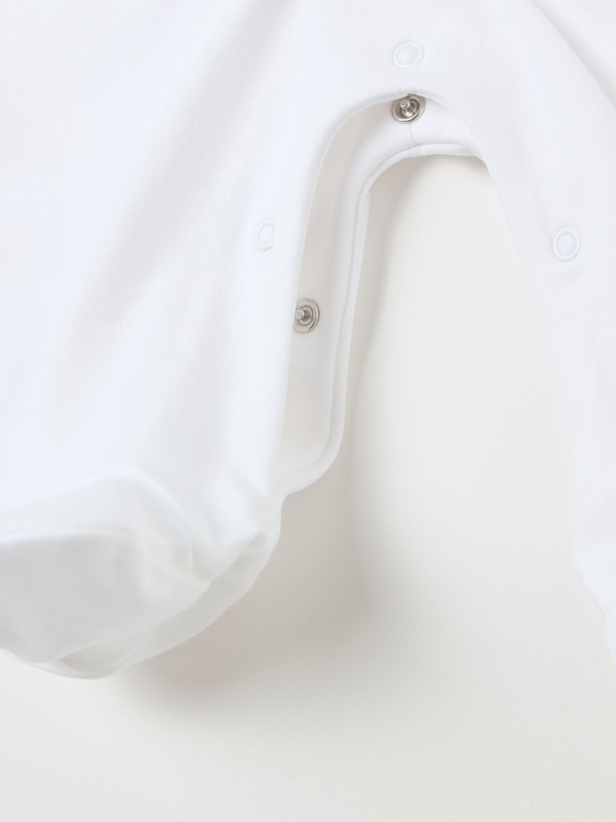 Tutina in cotone bio con piedini e stampa_2