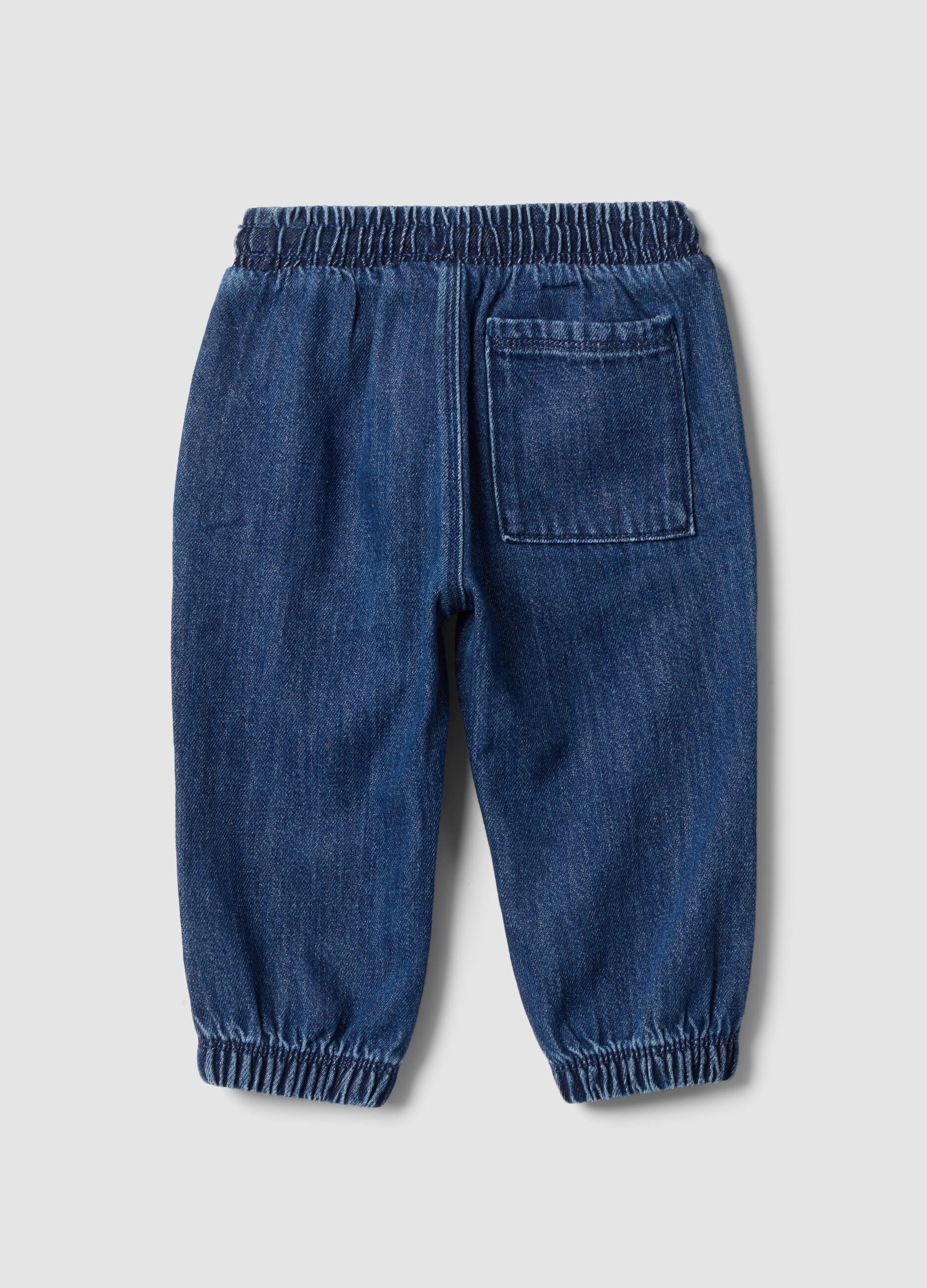 Blue denim trousers in a cotton and viscose blend with elasticated waist