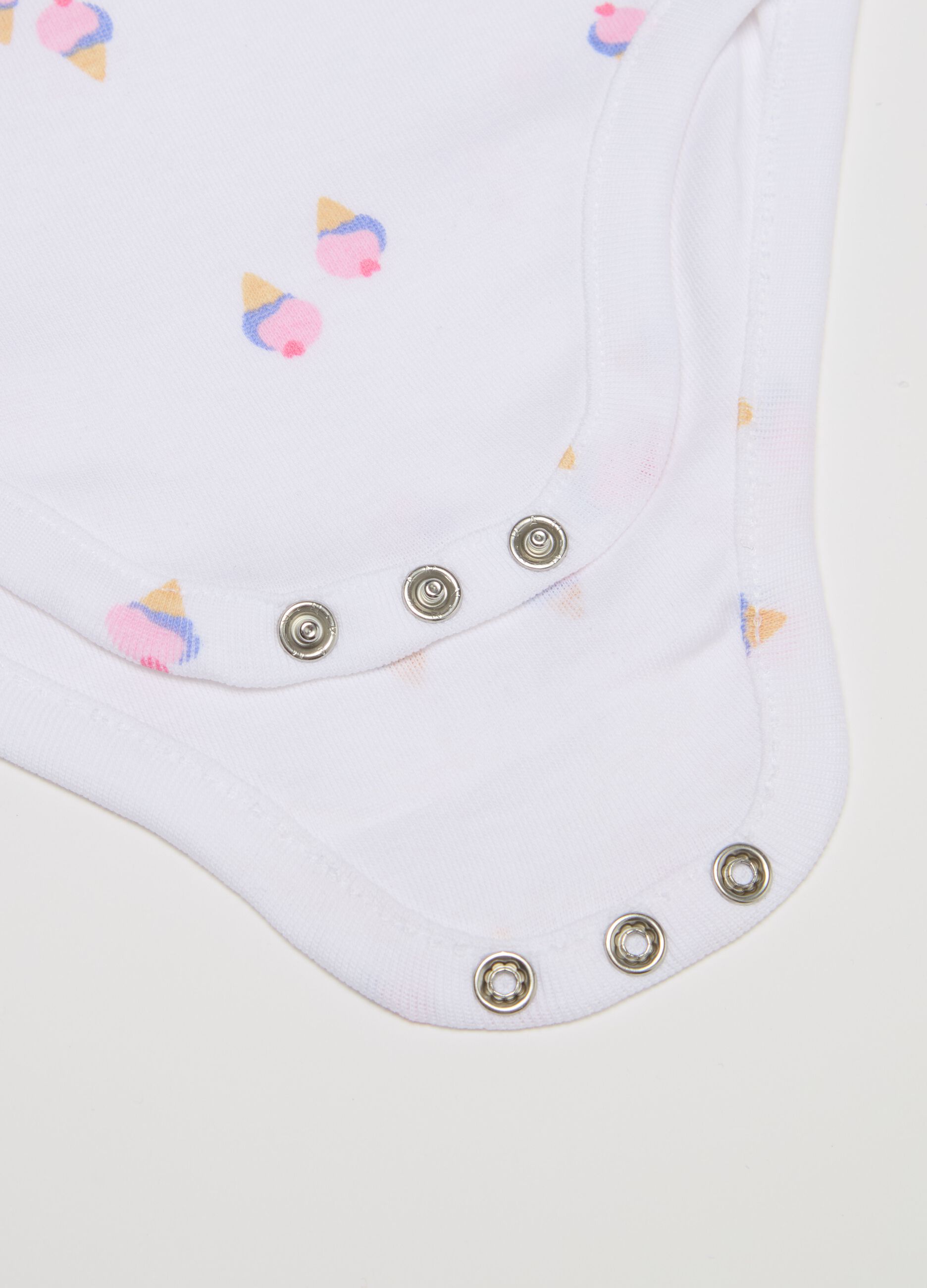 Two-pack sleeveless bodysuits in organic cotton with print