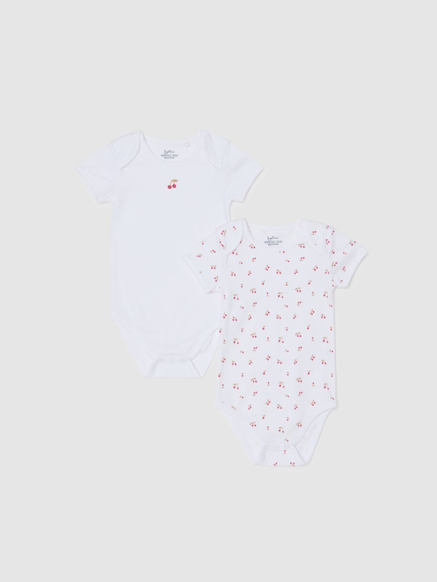 Set of two white pure cotton bodysuits for baby girls_0