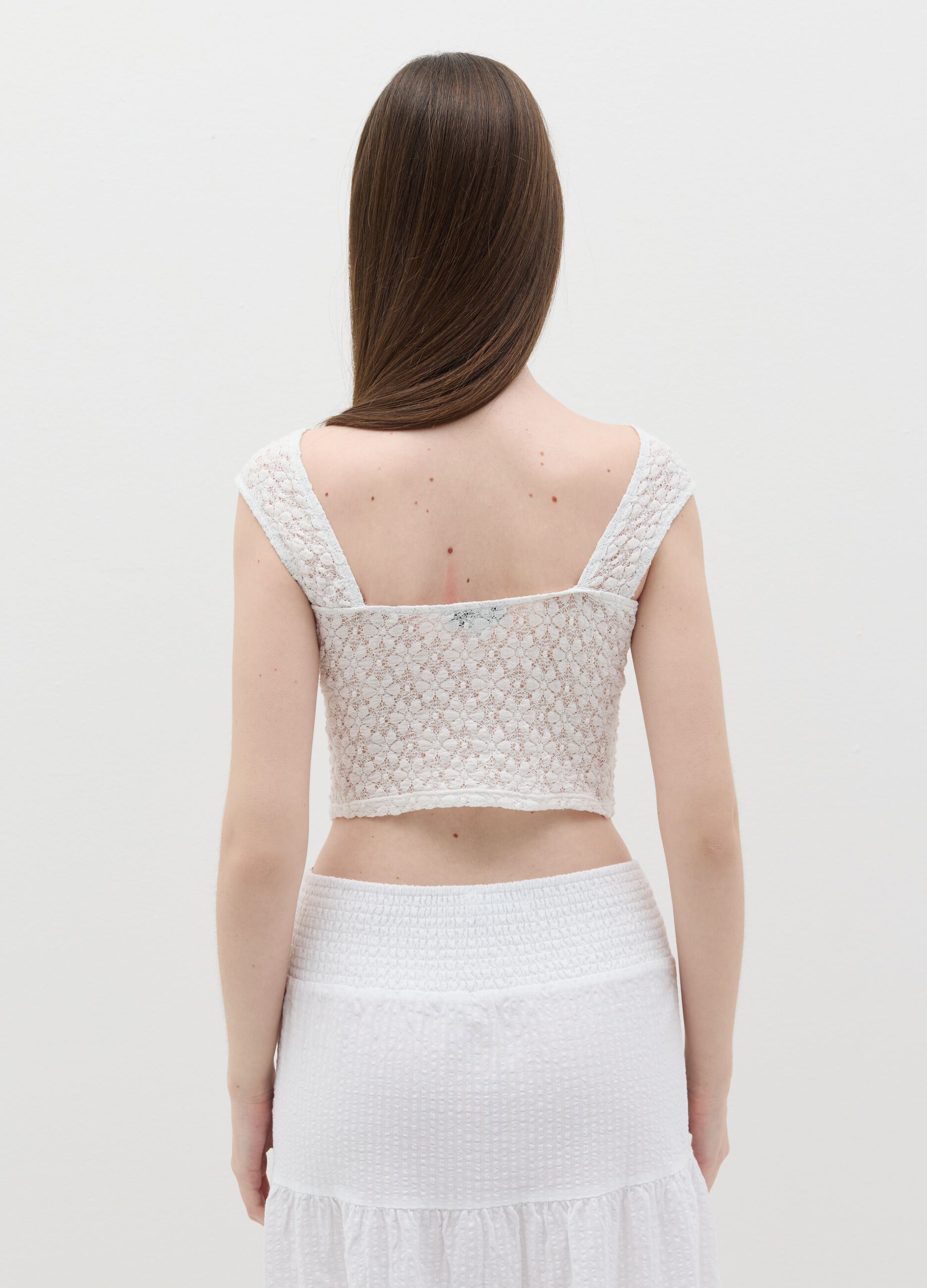 Lace-effect sleeveless top