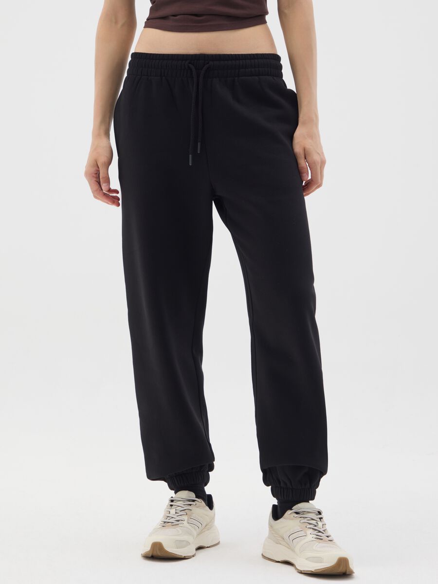 Black cotton blend regular fit trousers_1