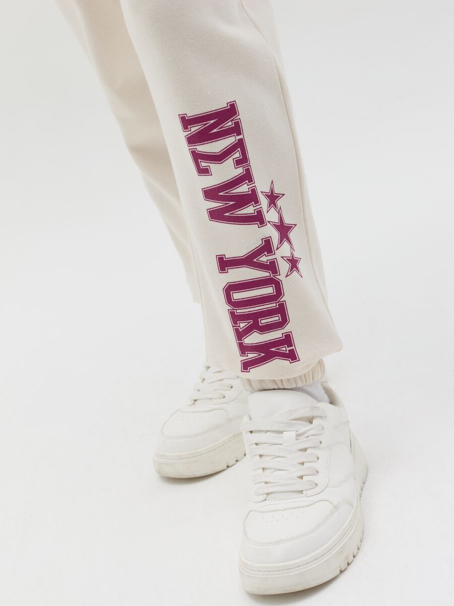 Joggers with elasticated edging and lettering print_1