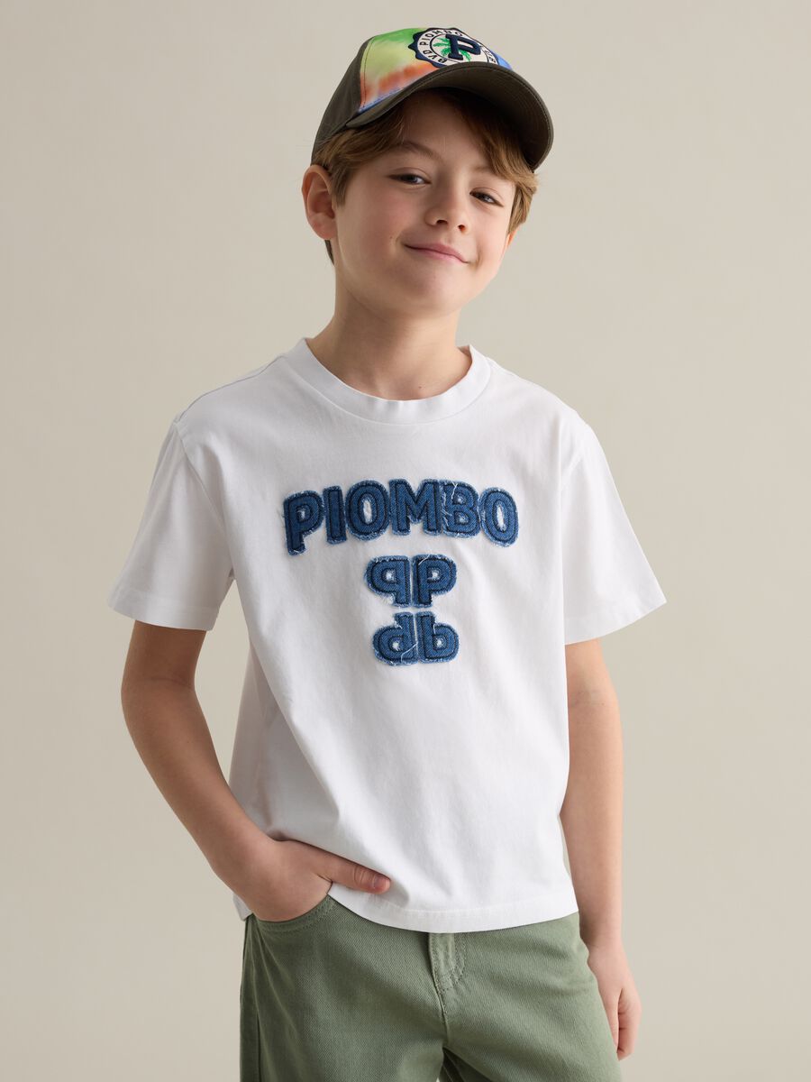 Cotton T-shirt with appliqué logo in denim_0