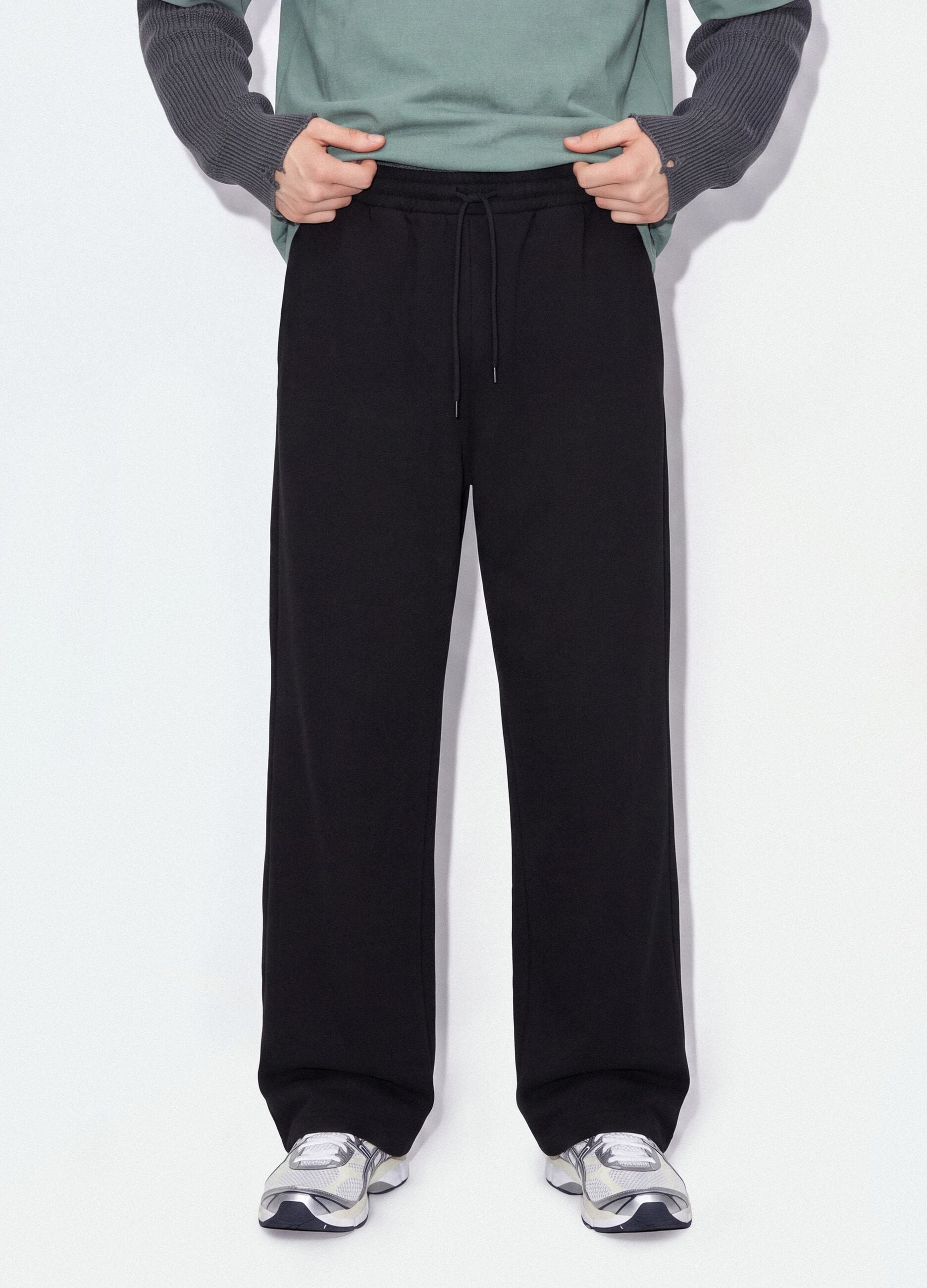 Black pure cotton joggers with elasticated waistband, oversized fit