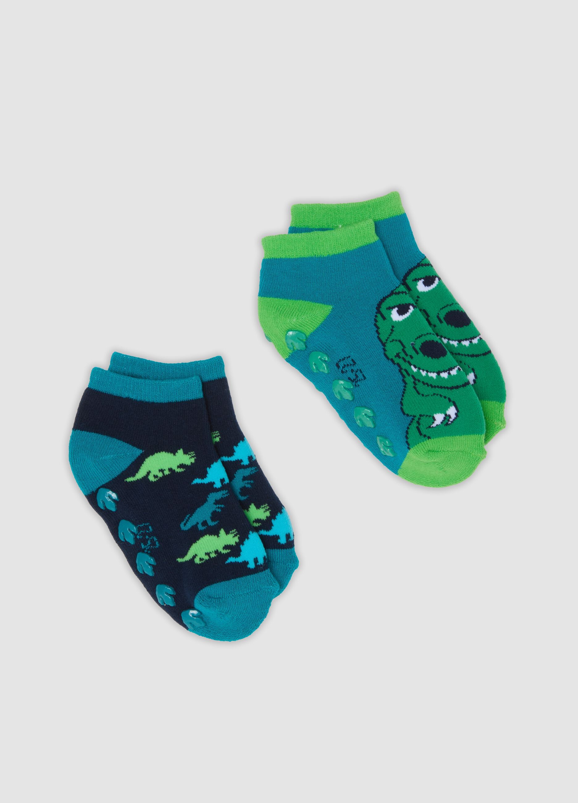2-pack of green anti-slip socks in stretchy organic cotton with dinosaur print