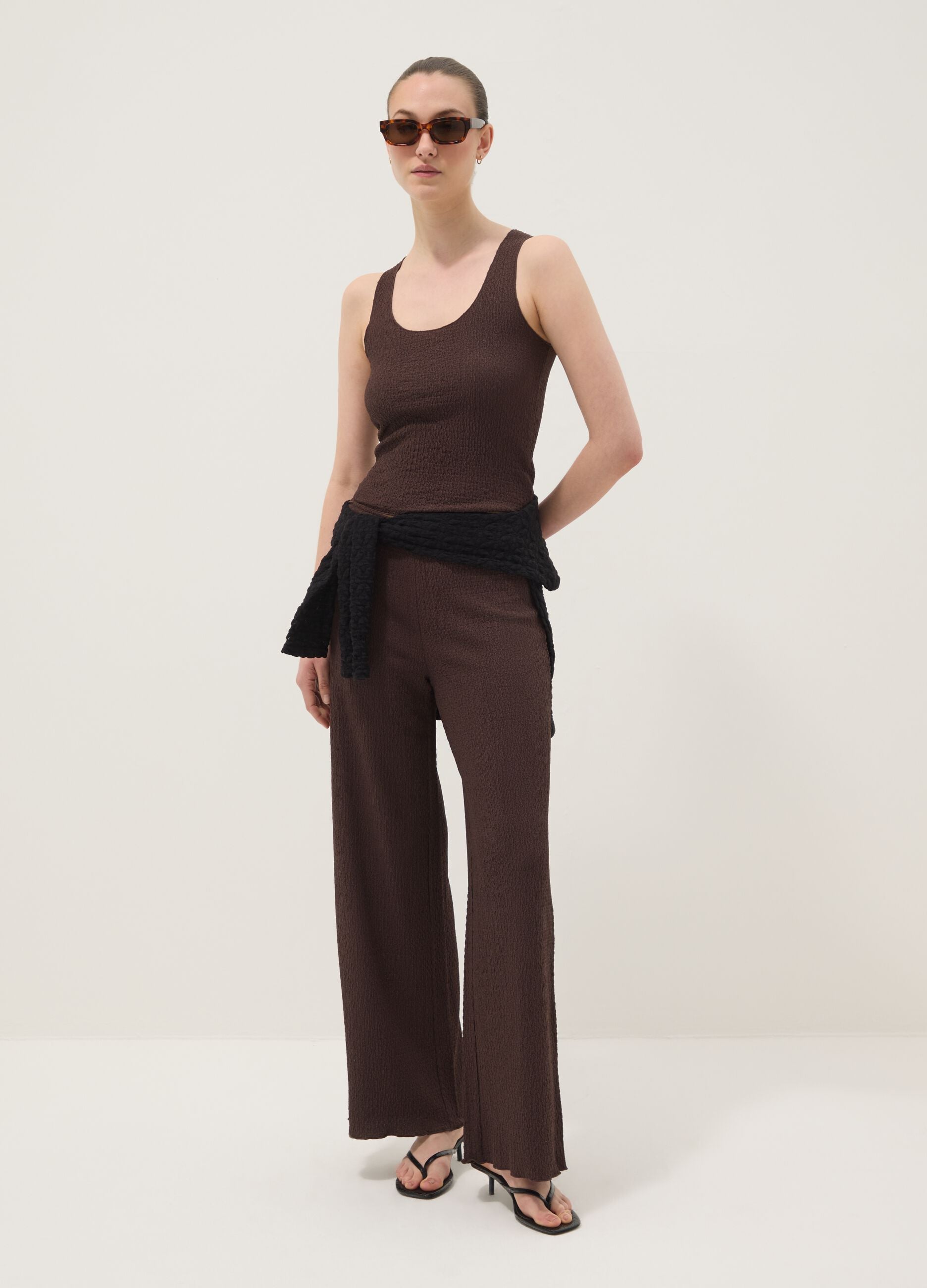 Brown stretch wide-leg trousers with crinkled texture
