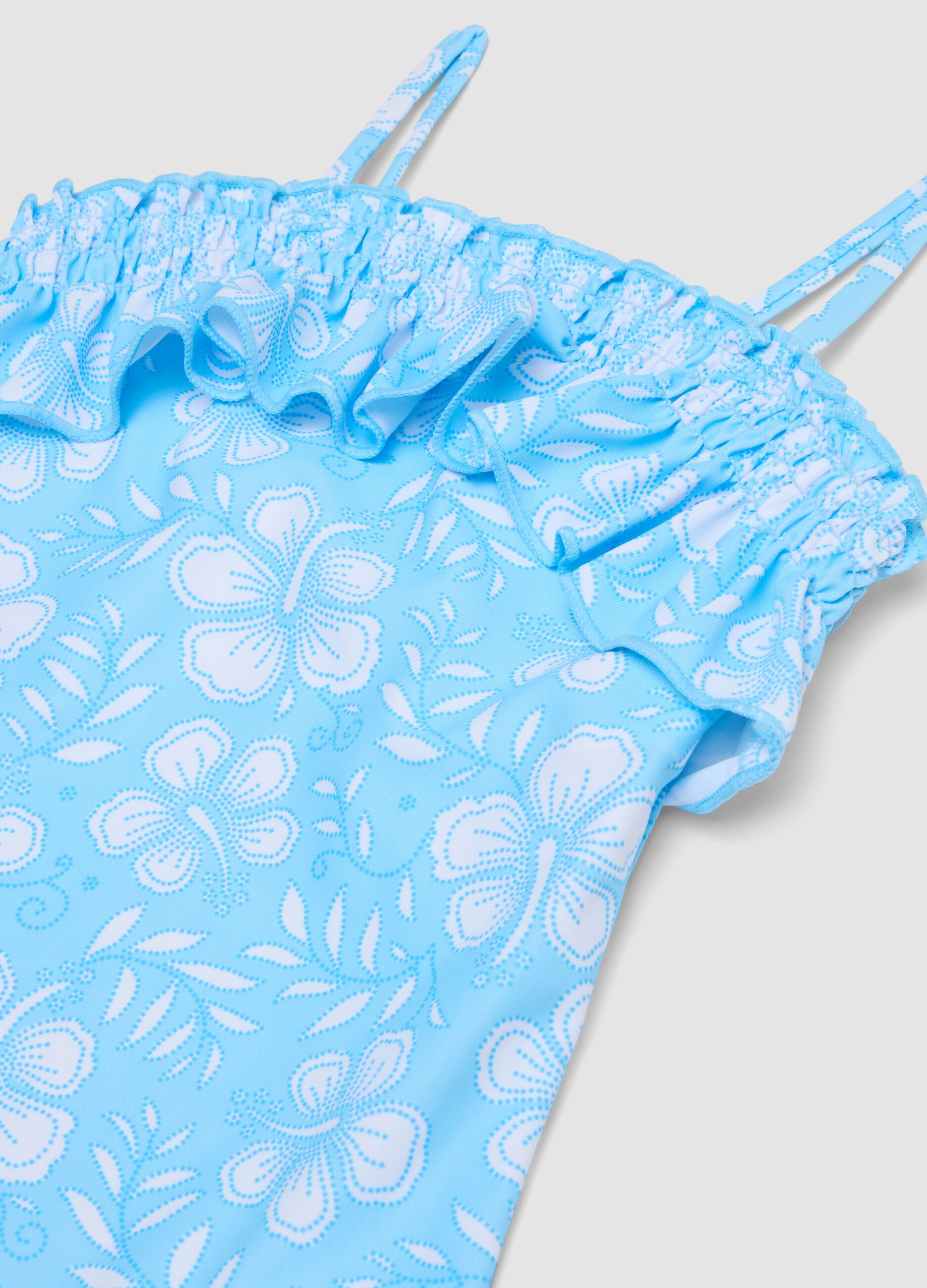 Light blue girls&rsquo; swimsuit with frills