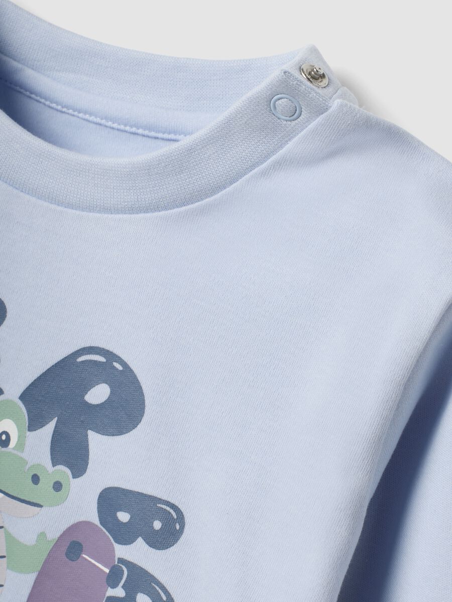 Pigiama azzurro in puro cotone organico con stampa per neonato_2