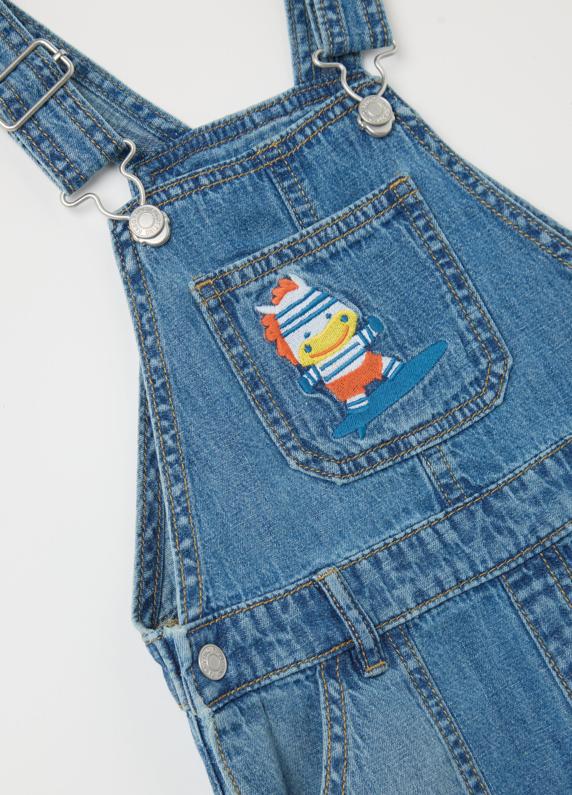 Salopette denim con tasche e ricamo zebra surfista