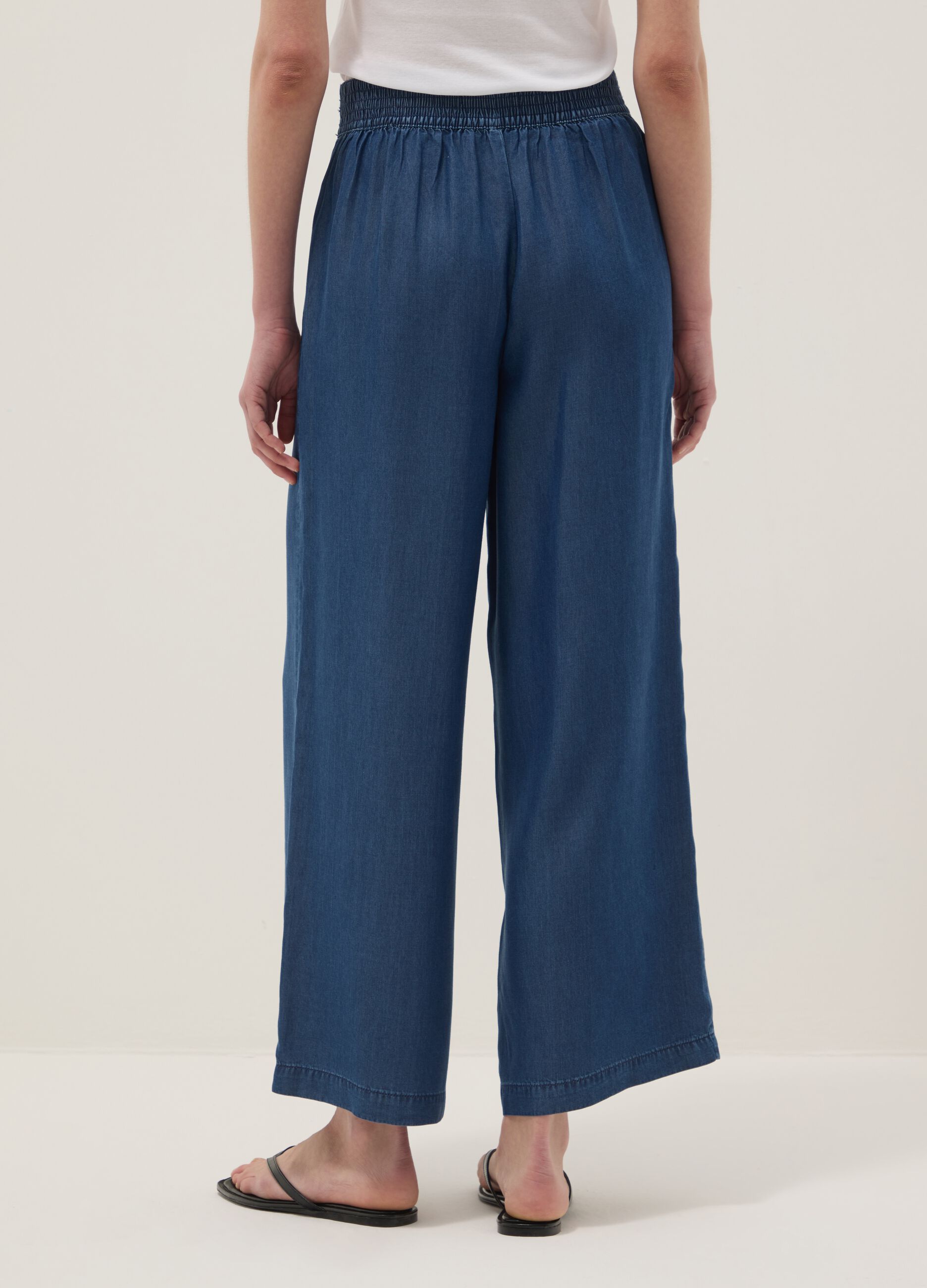 Dark blue pure lyocell palazzo trousers with elasticated waist and wide leg