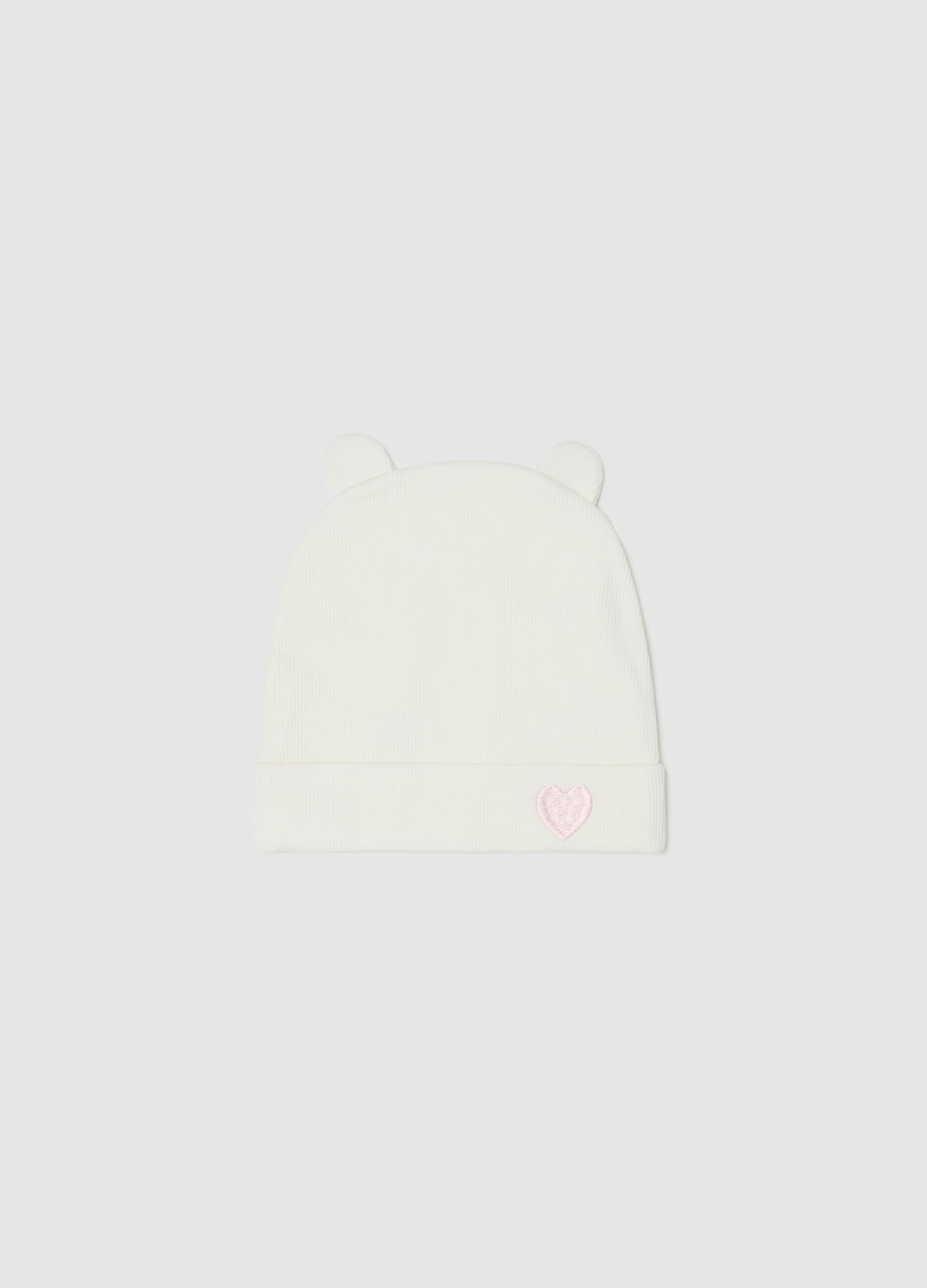 Knitted hat with ears and heart embroidery