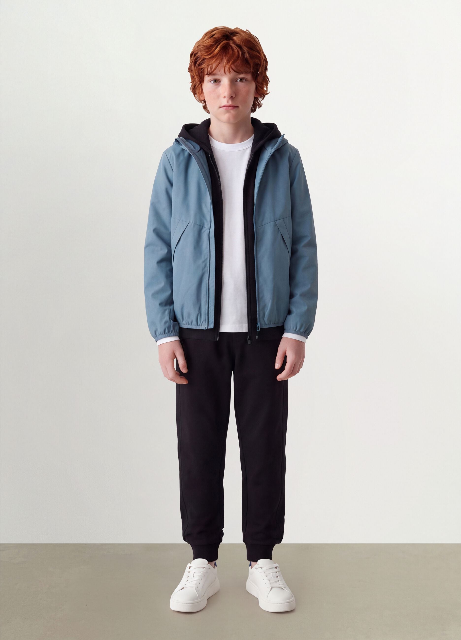 Blue oversized rain jacket with hood and zip for boys
