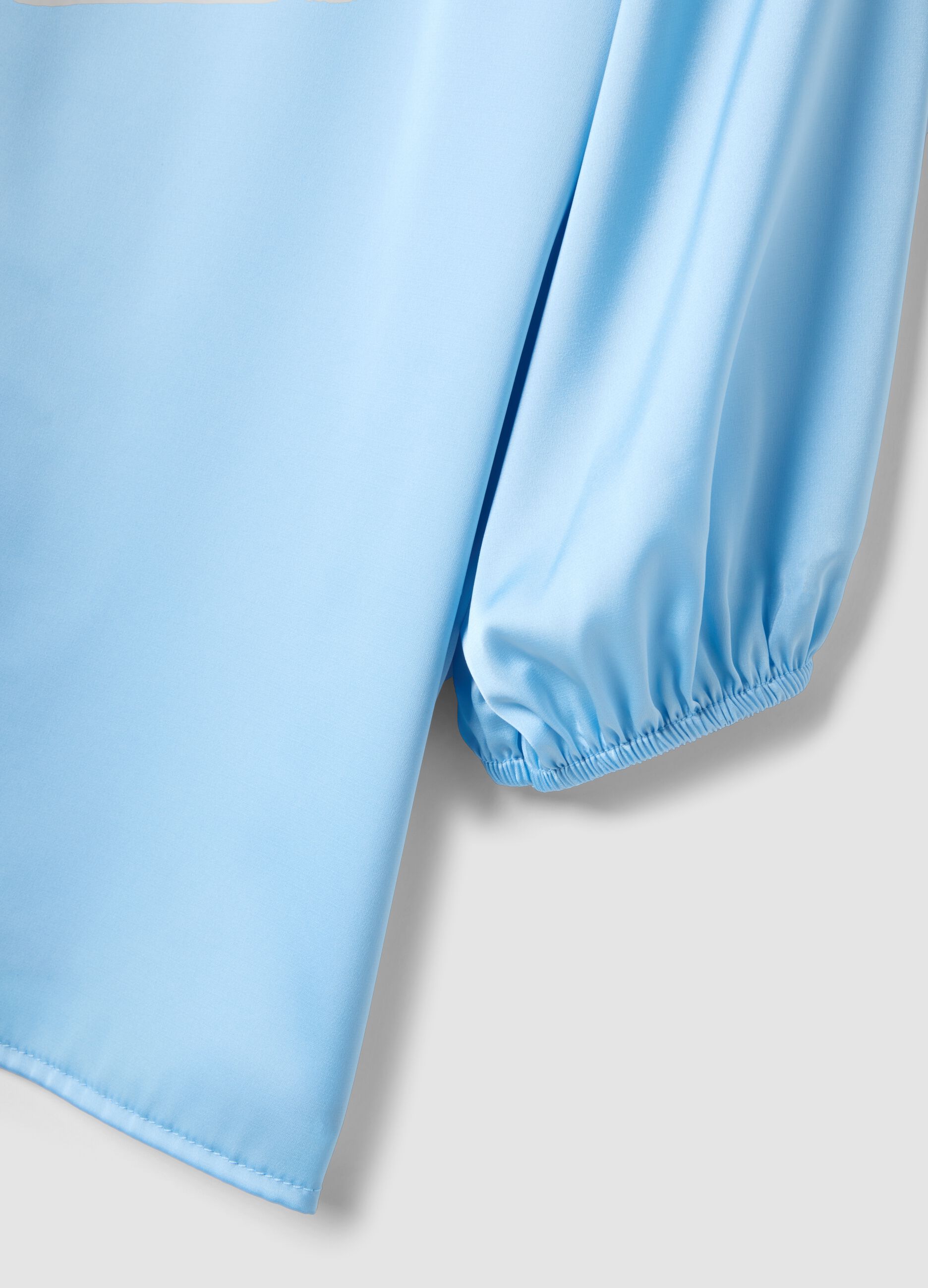 Blue long-sleeve regular fit top with teardrop closure