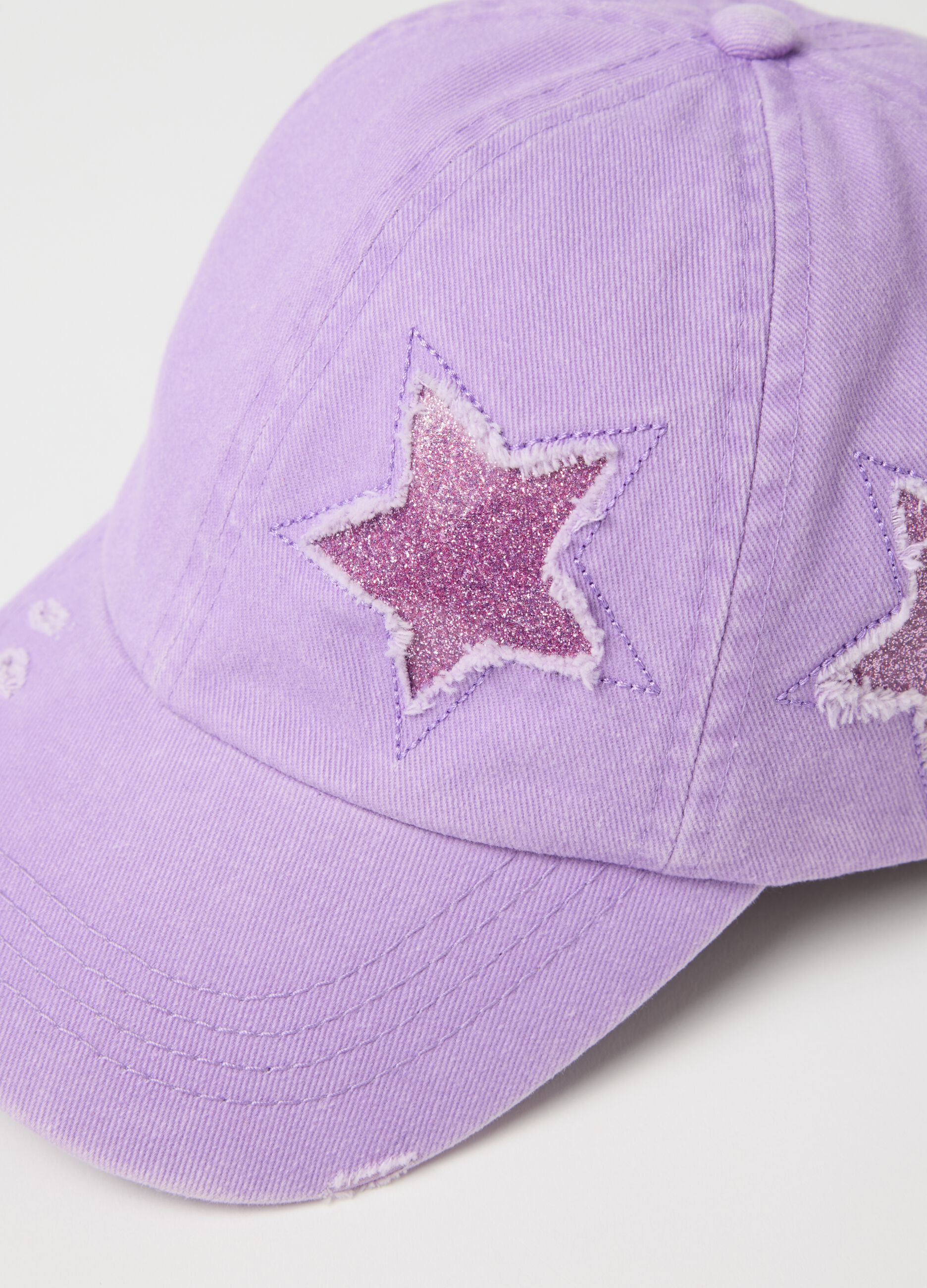 Purple baseball cap with glitter star
