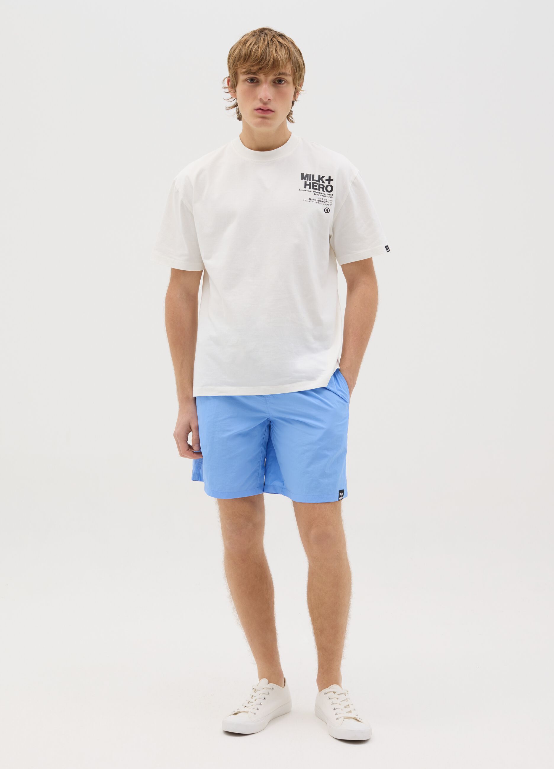 Blue swim shorts in mixed fabric