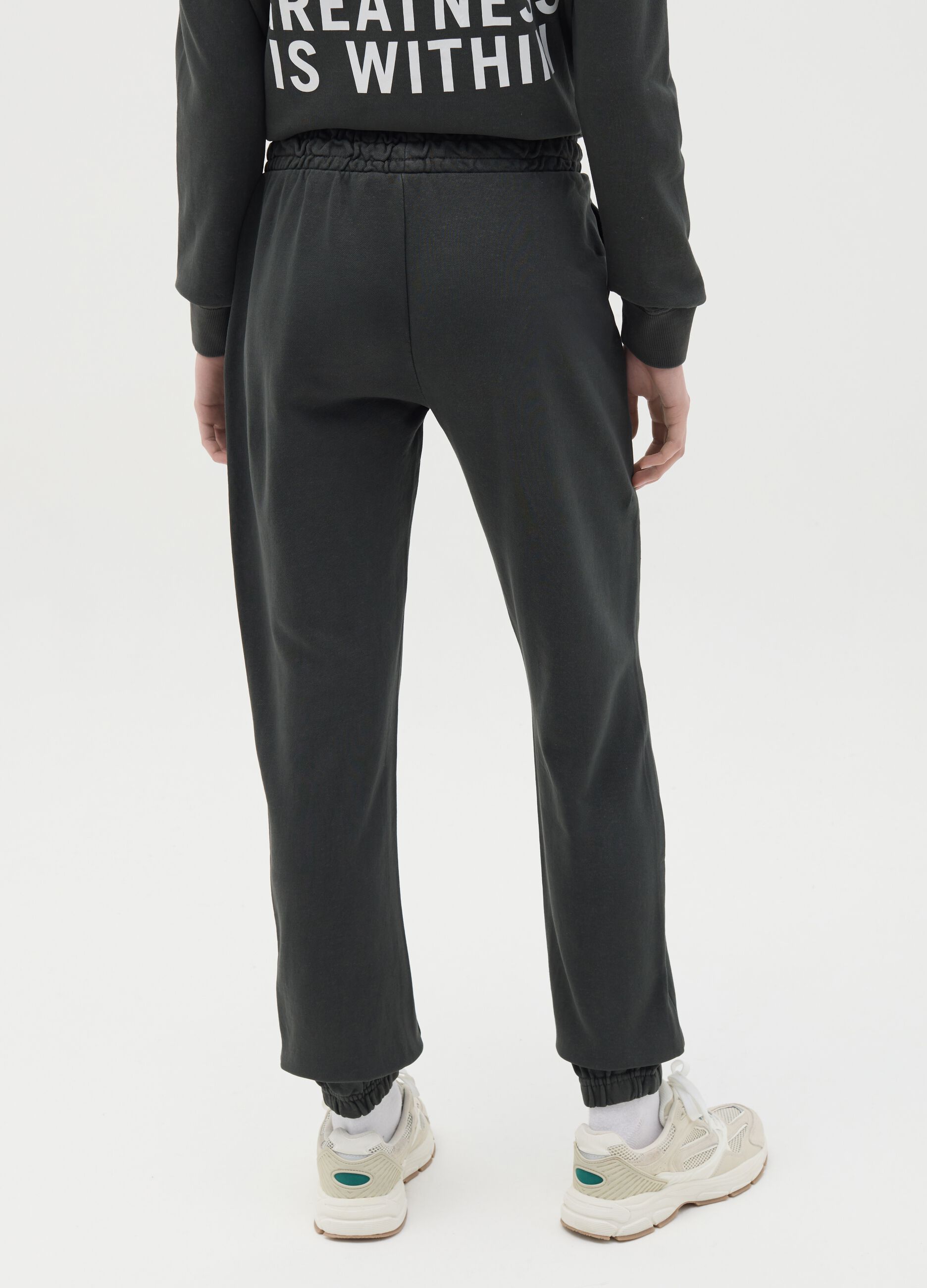 Black joggers with elasticated edging and logo print