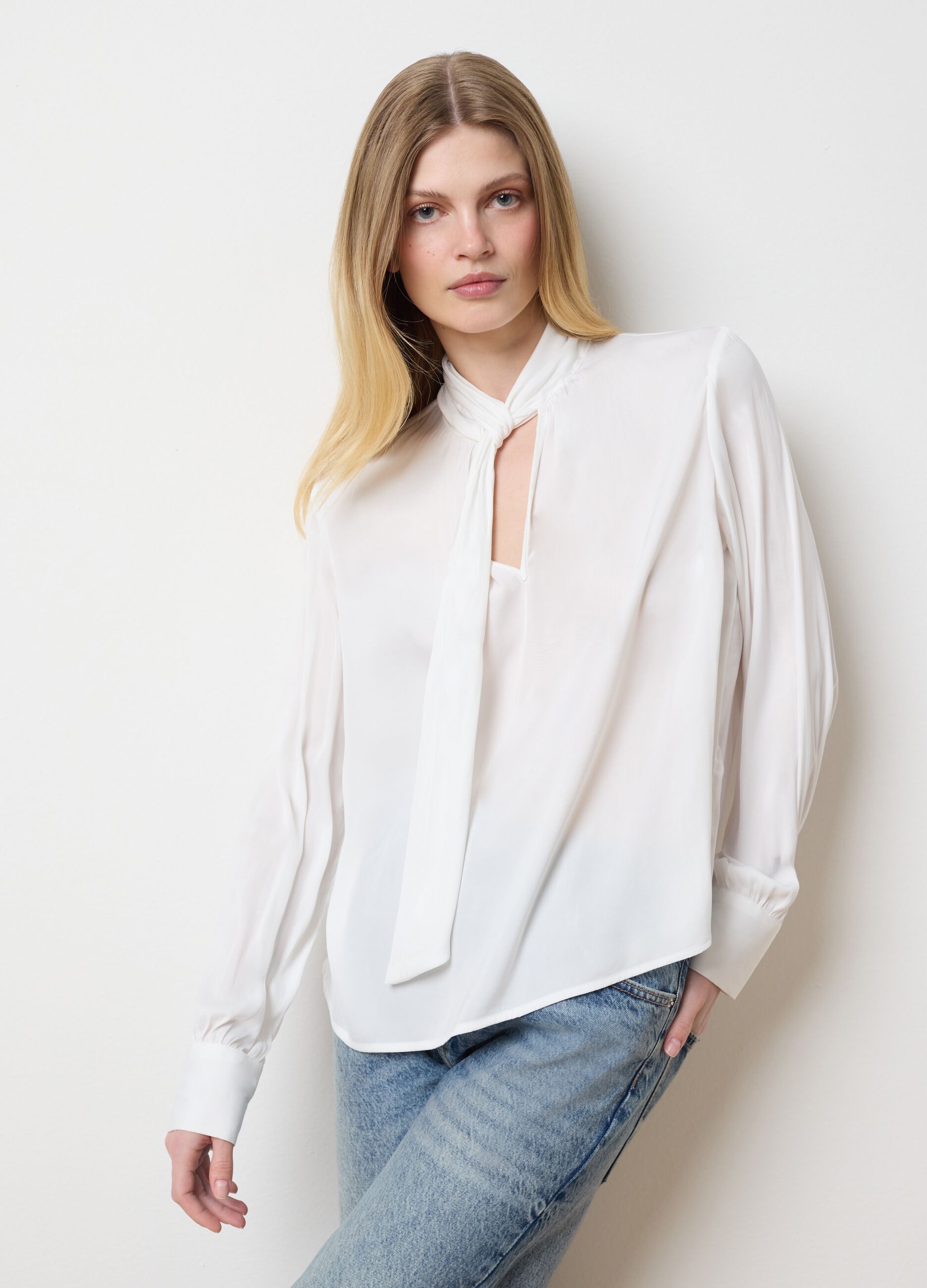 White blouse with bow