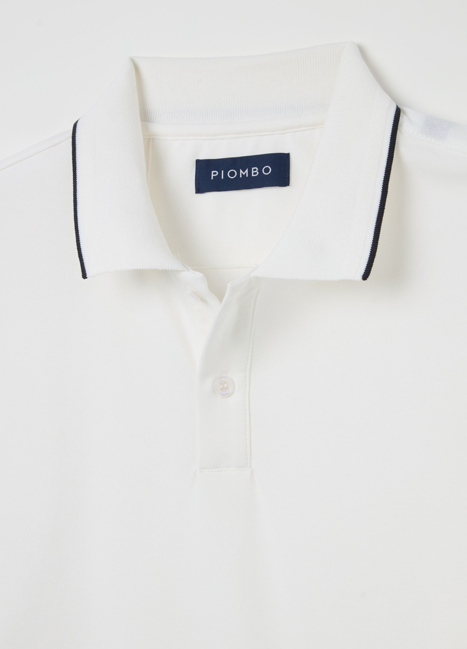 Polo shirt in technical fabric with contrasting edging