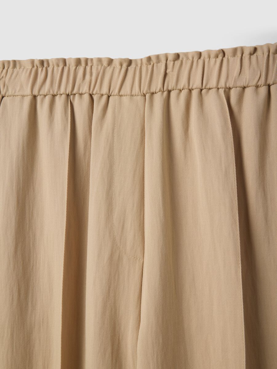 Beige wide leg jogger trousers in Lyocell and viscose blend_6