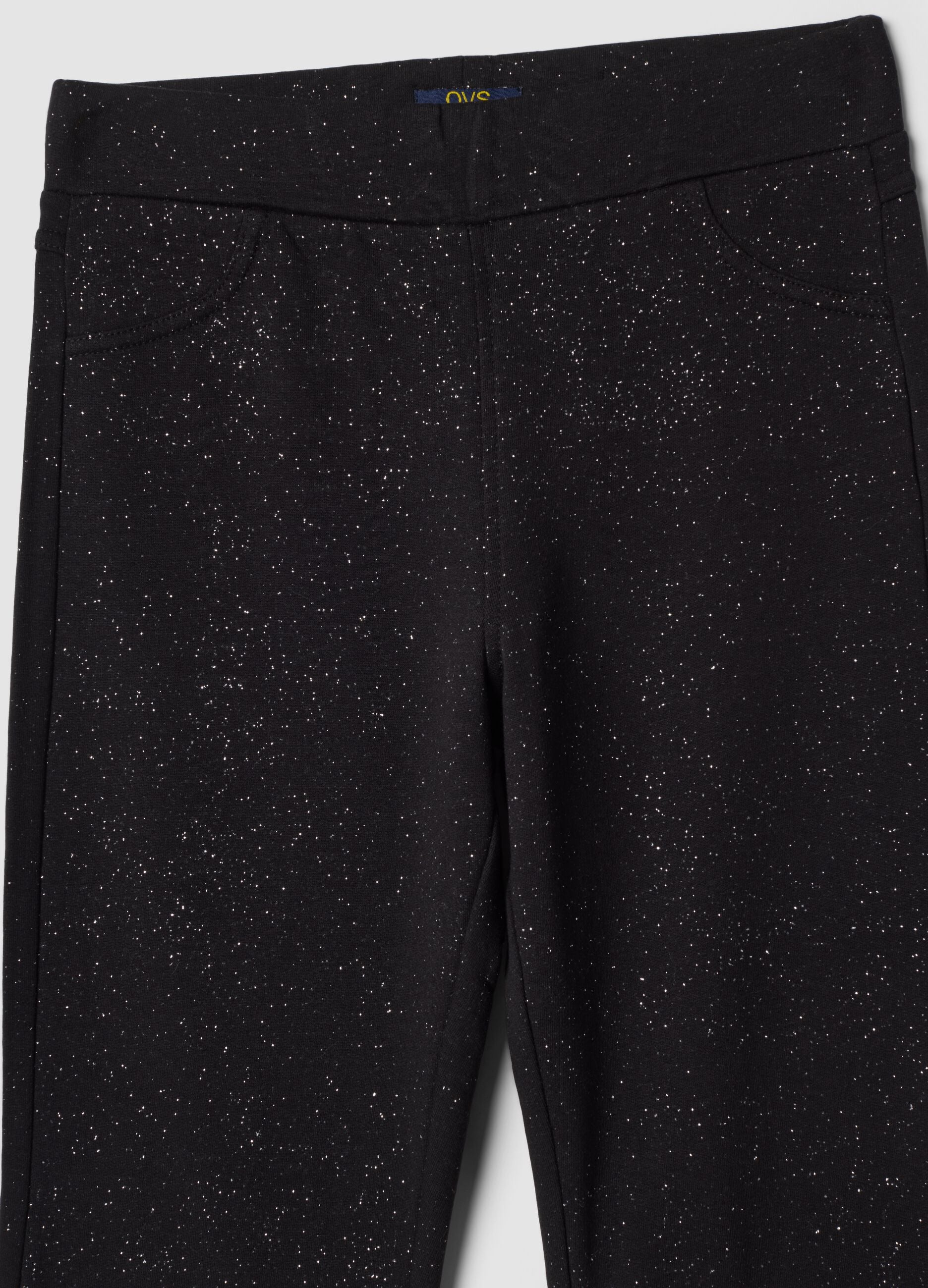 Pantaloni flare neri in cotone elasticizzato con stampa glitterata