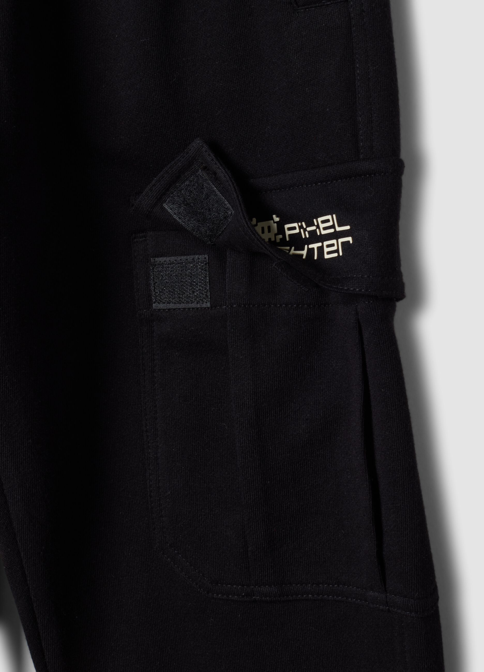 Black pure cotton cargo trousers with elasticated waist, oversized fit